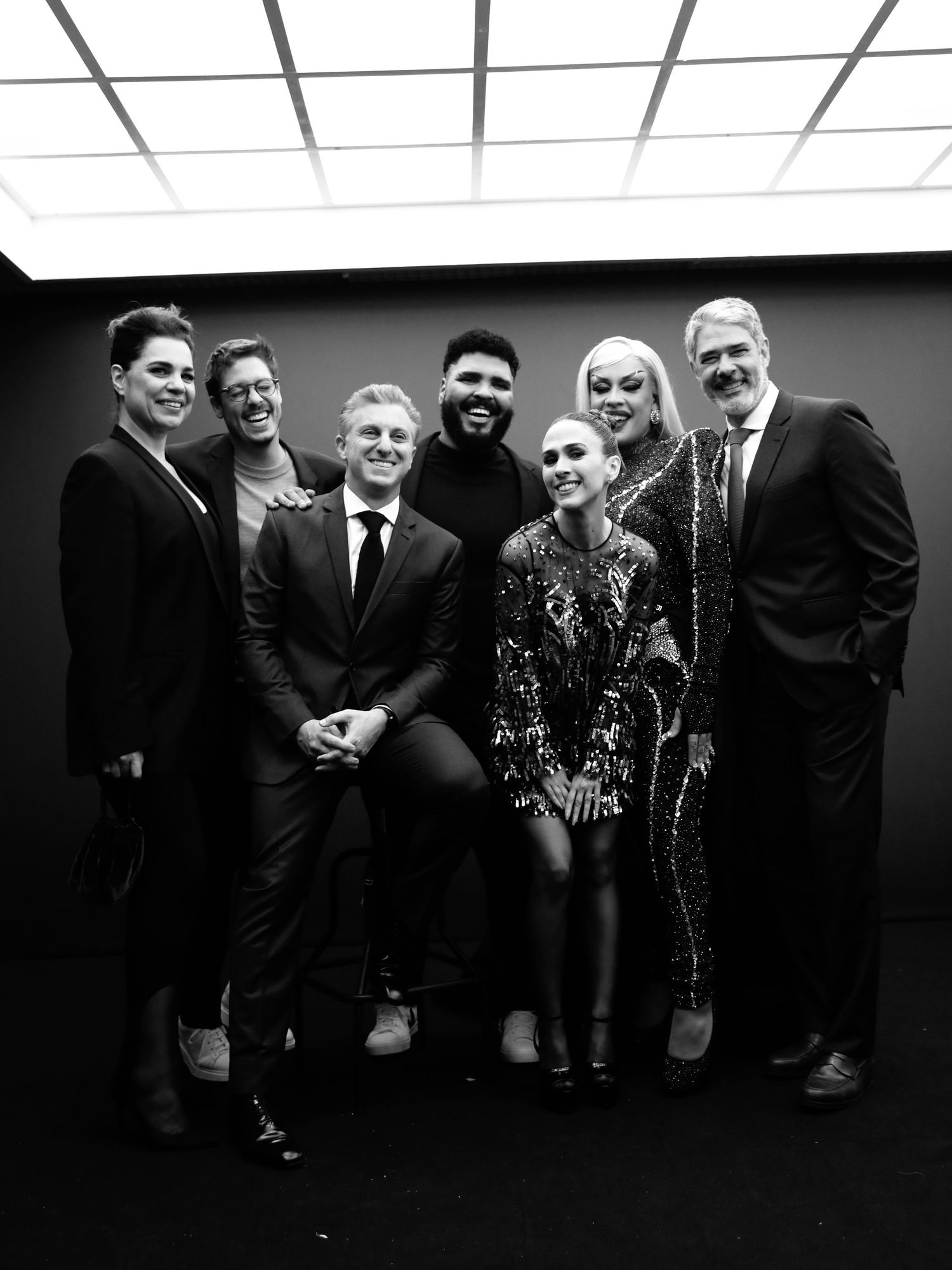 Black and white group photo of people in formal attire.