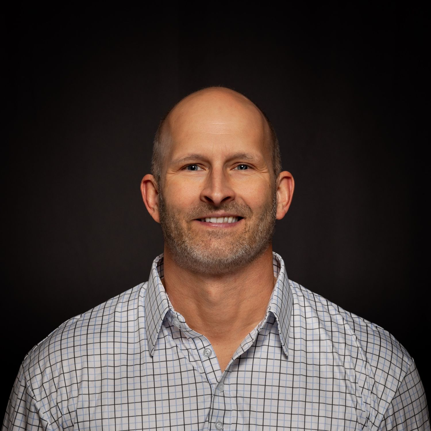 A photograph of Alex, the owner of Zander Stills