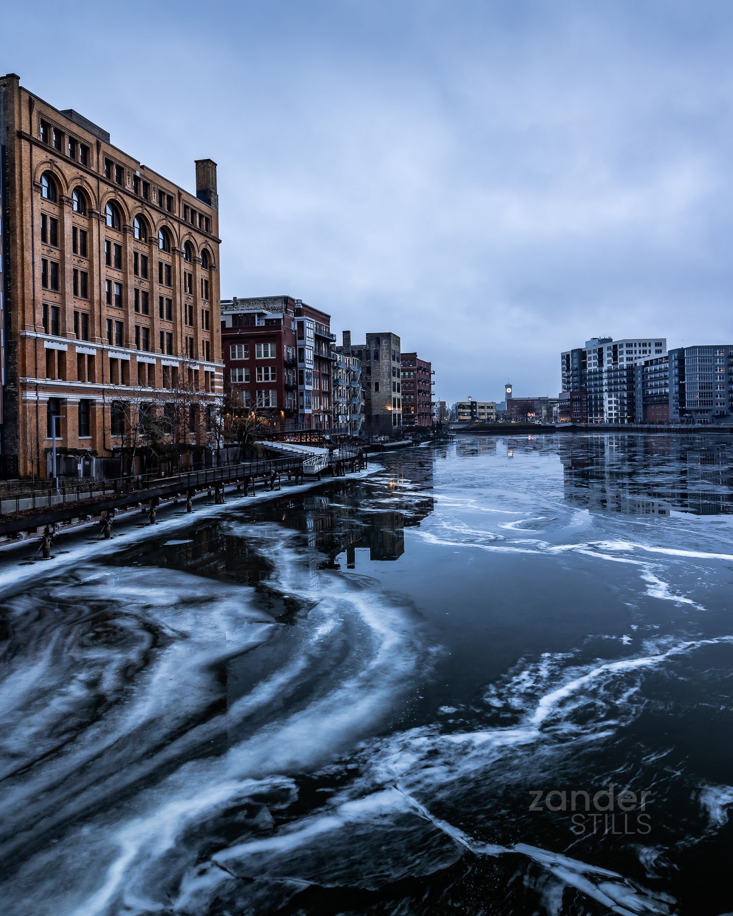 Cityscape in the Third Ward of Milwaukee. The MIlwaukee River is frozen.