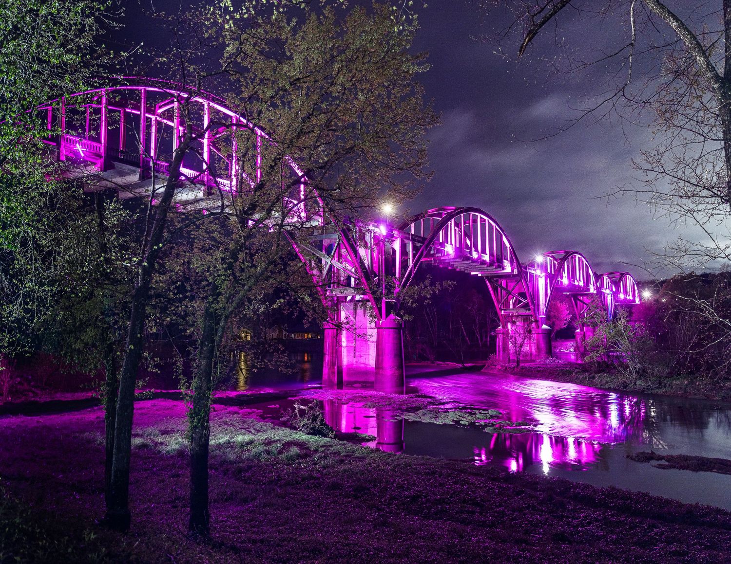 Cotter Bridge in Cotter, AR lit in purple
