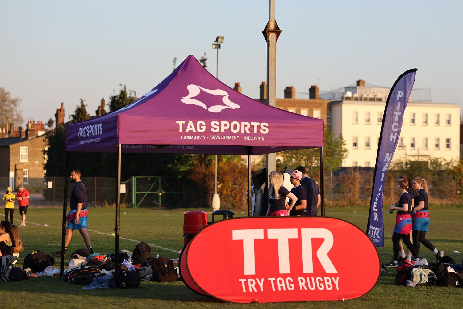 A pop up banner showcasing the branded banners of TTR rugby corporate event