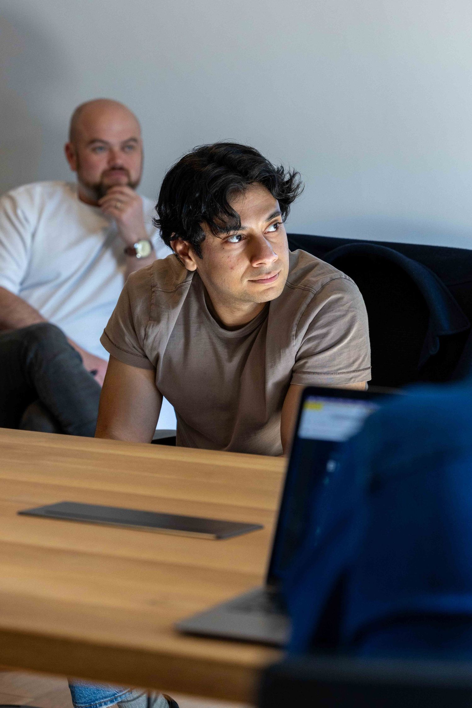 A man listening to the a meeting