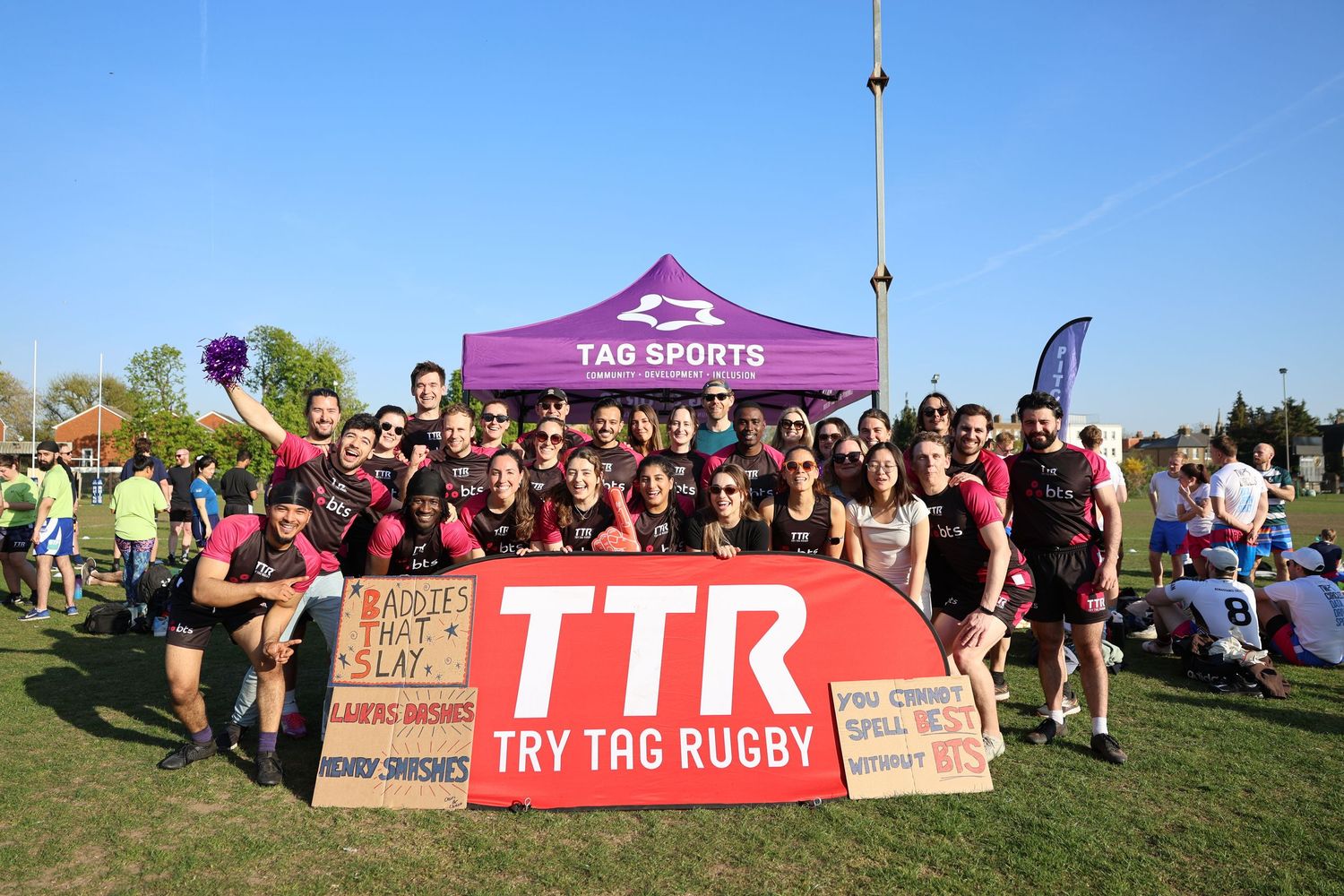 Teams celebrating with supporters at a corporate event