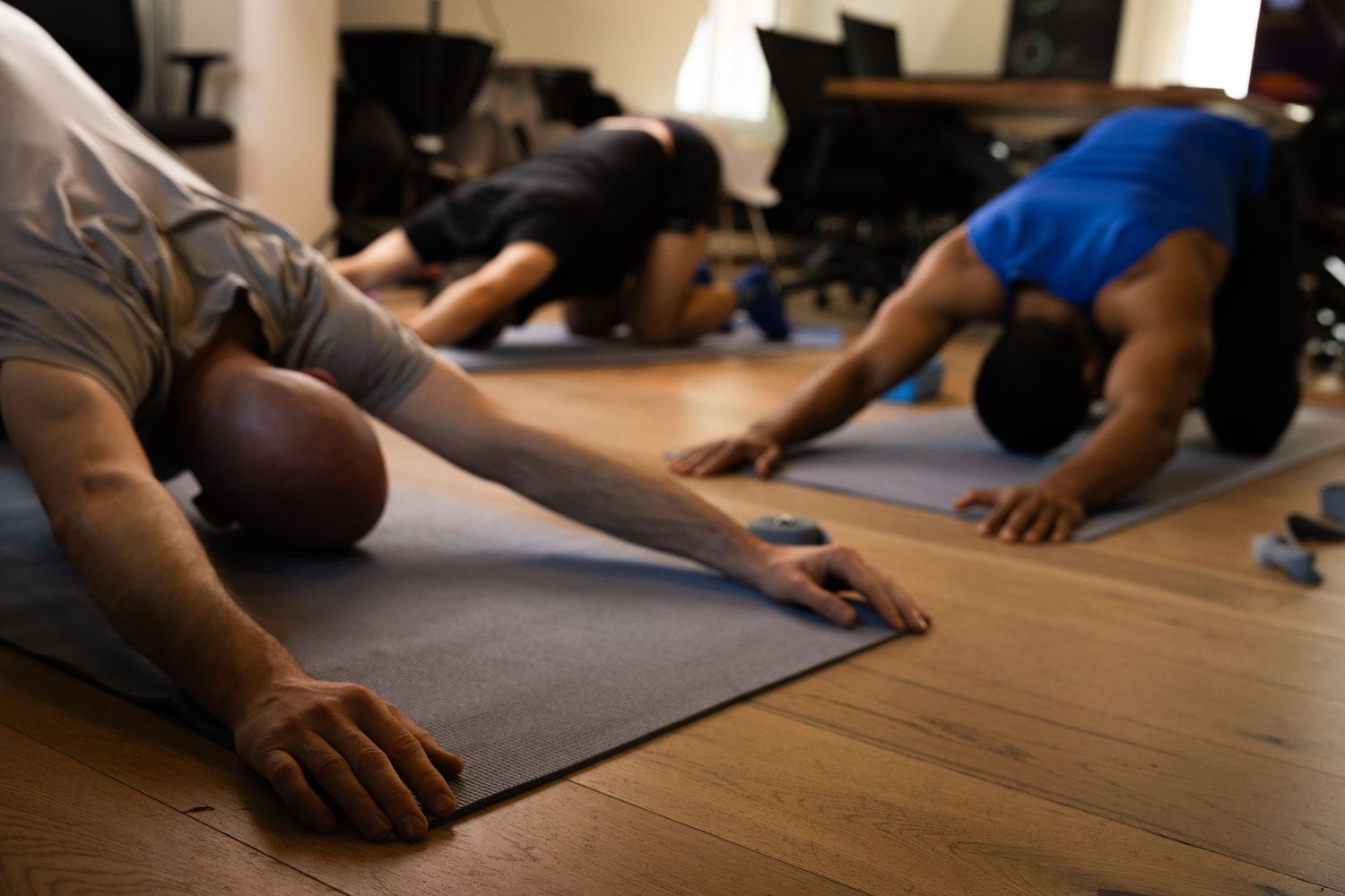 men doing yoga