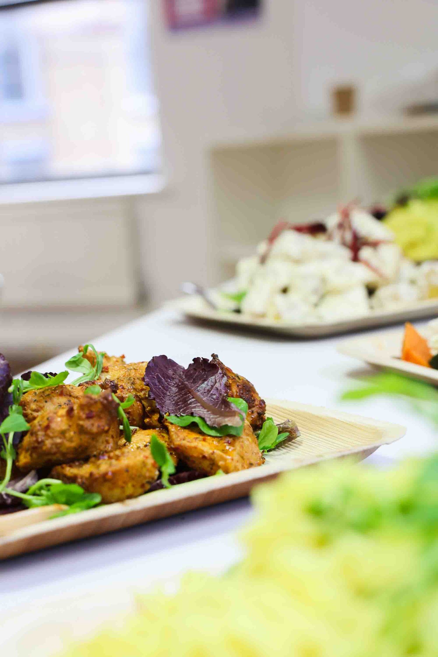 A picture of a long table filled with food