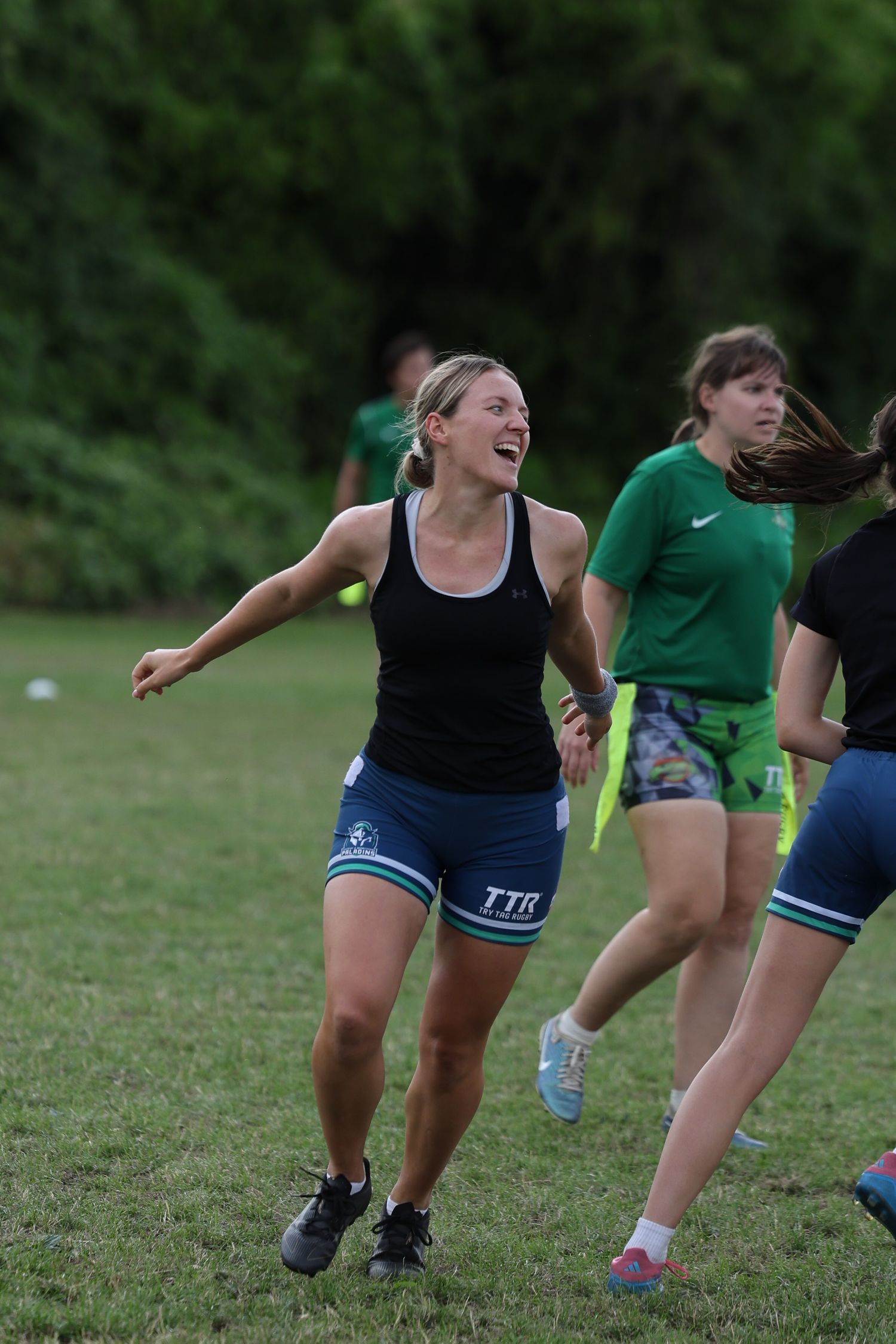 Tag player smiling and running at getting a win