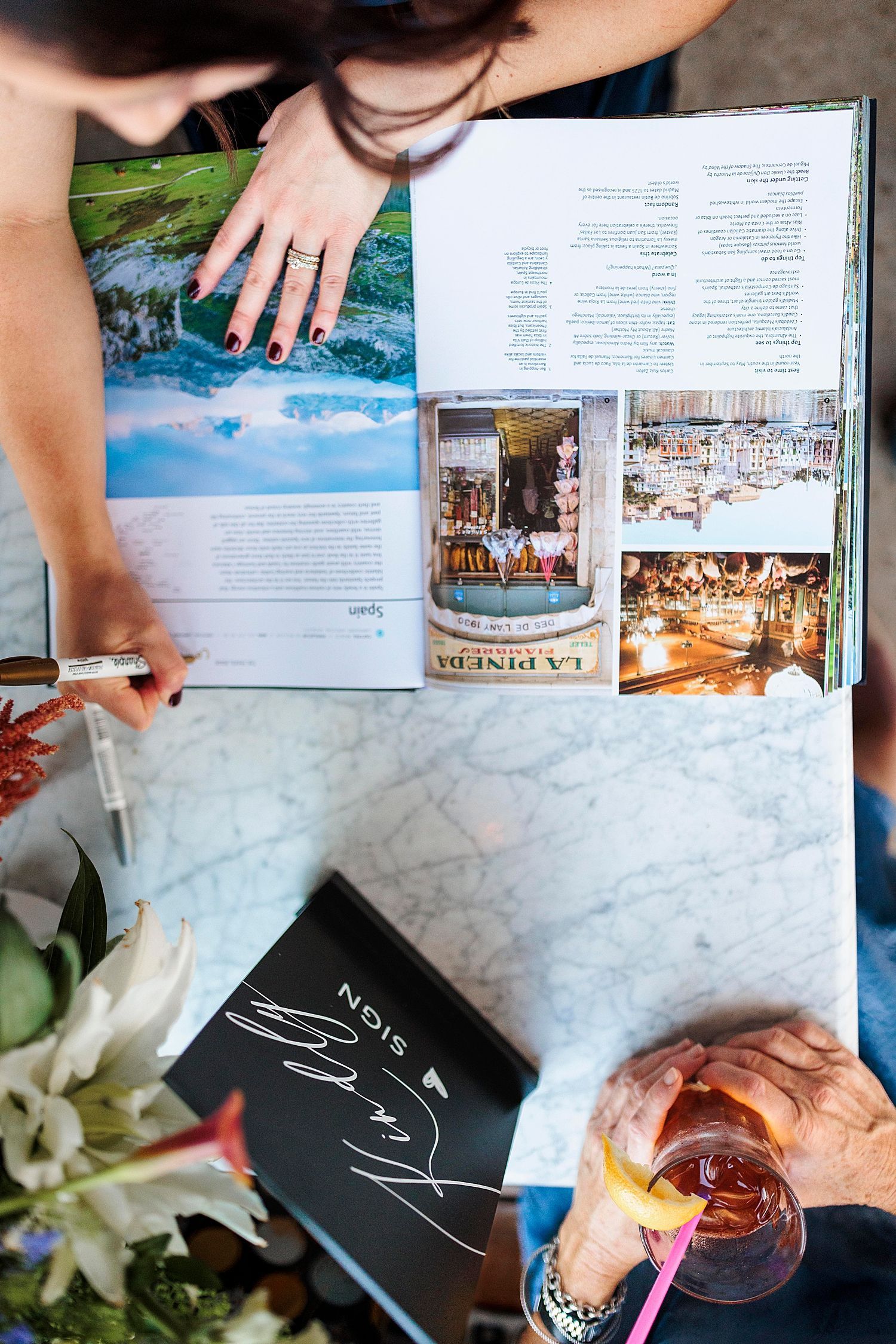 guests sign book for couple at reception by Austin Wedding Photographer