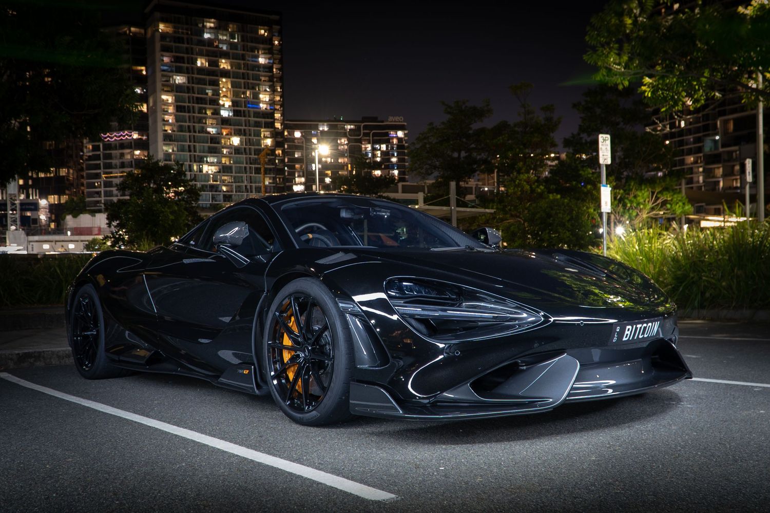 Bitcoin Mclaren under night skies