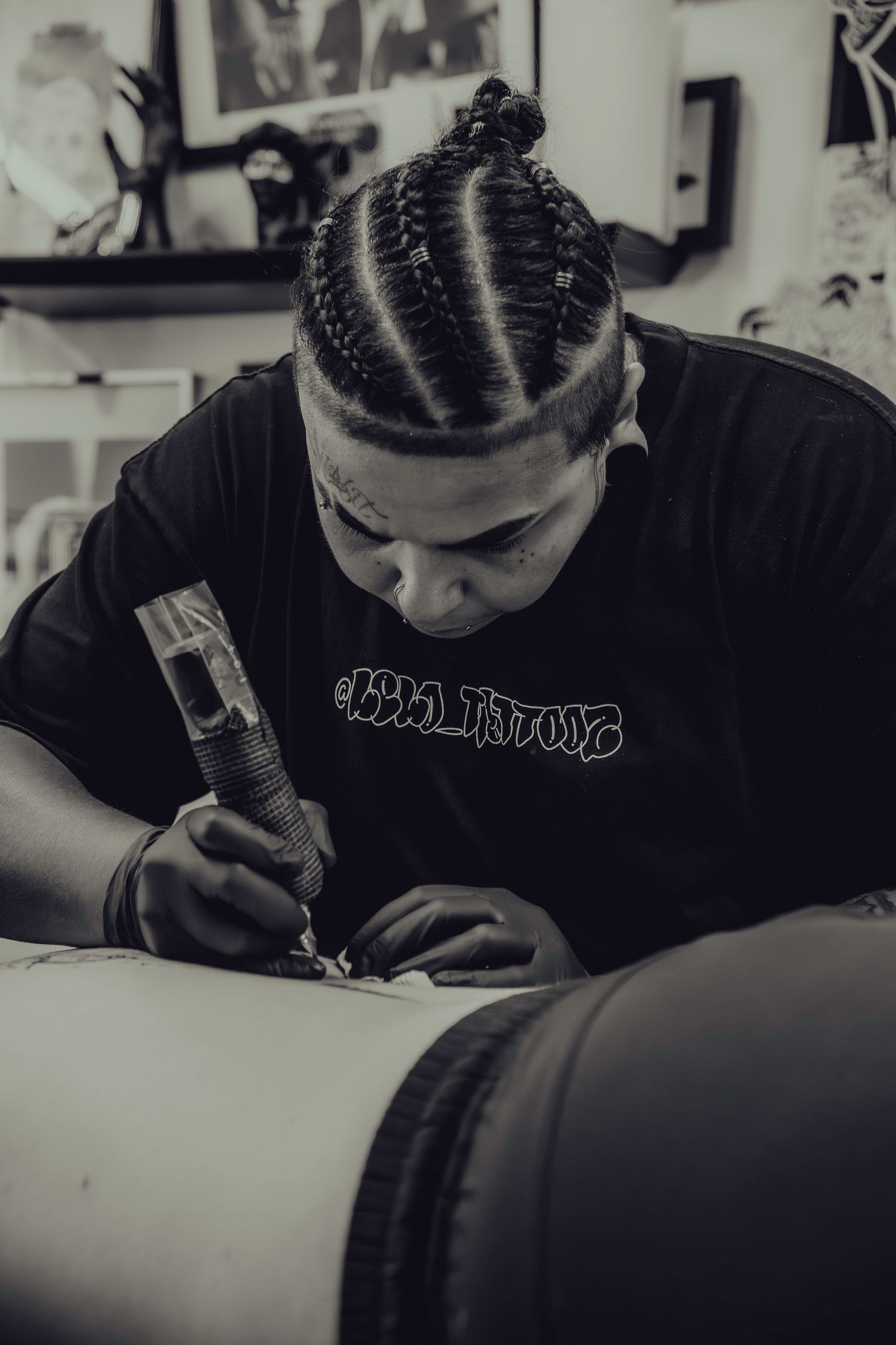 Close-up of detailed black and grey tattoo in progress