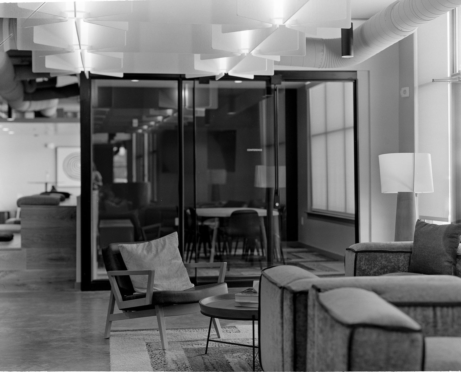 Luxury Savannah apartment work space with natural light and minimalist decor.