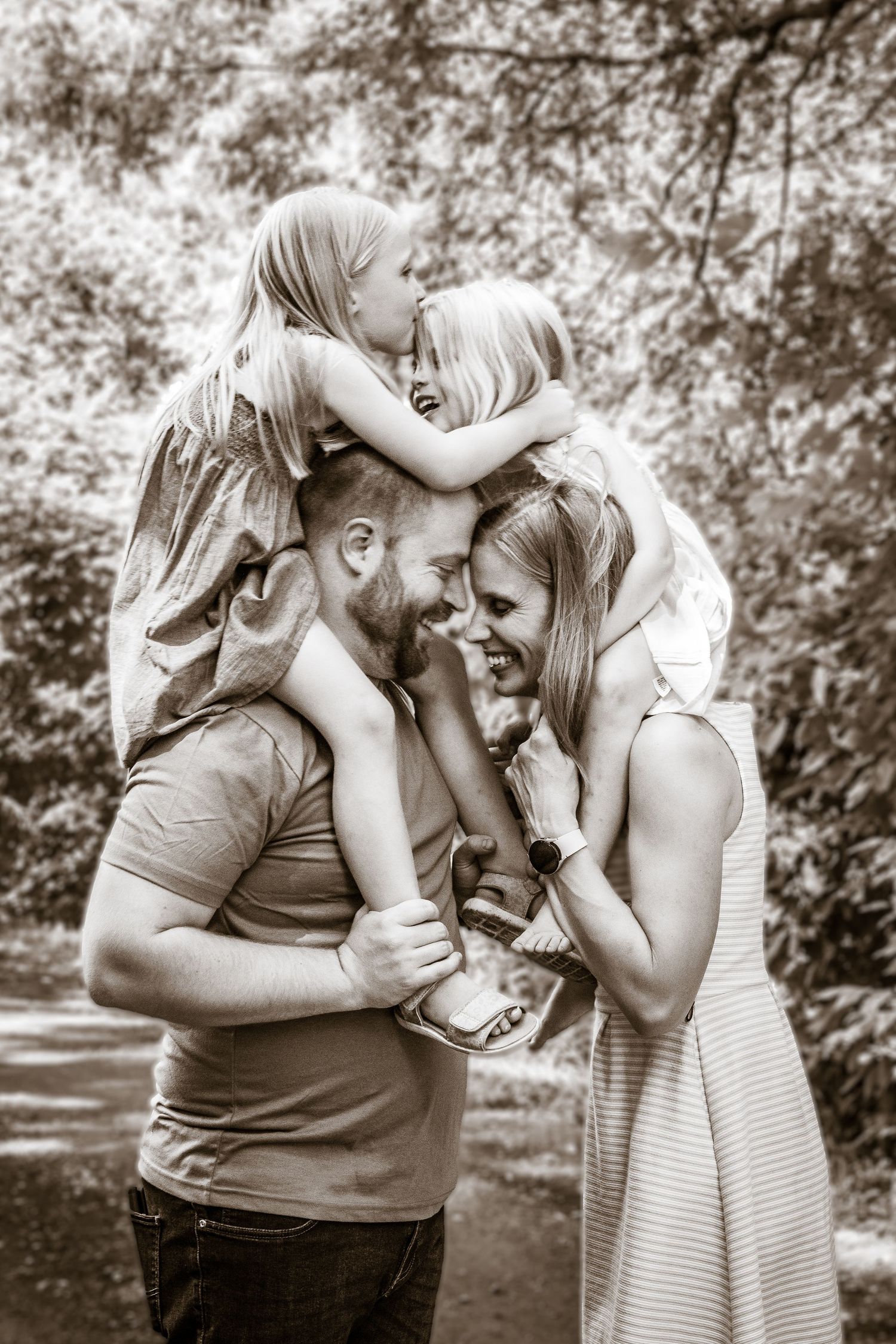 black and white photo, family with two girls