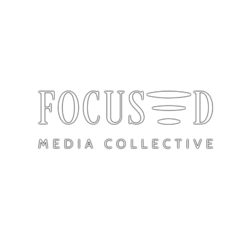 Minimalist white text logo for Focus-D Media Collective with clean typography and horizontal lines.