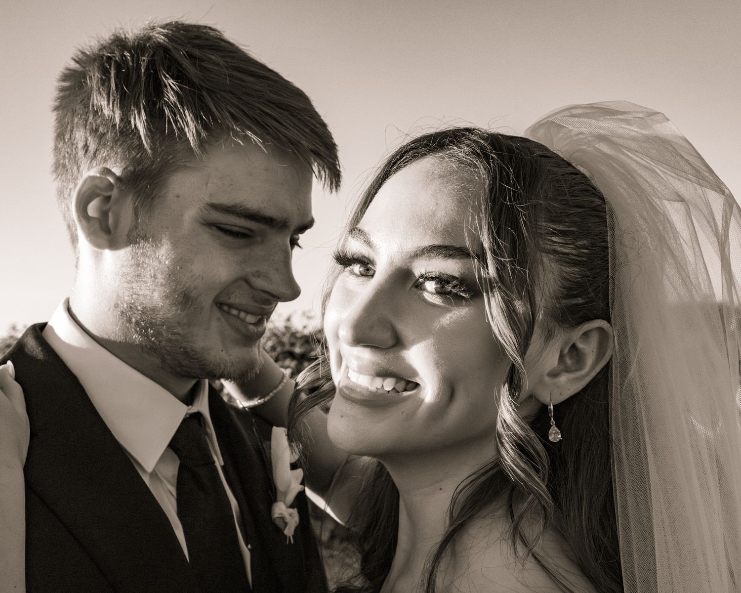 Black and white artistic wedding portrait sequence showing intimate romantic moments.