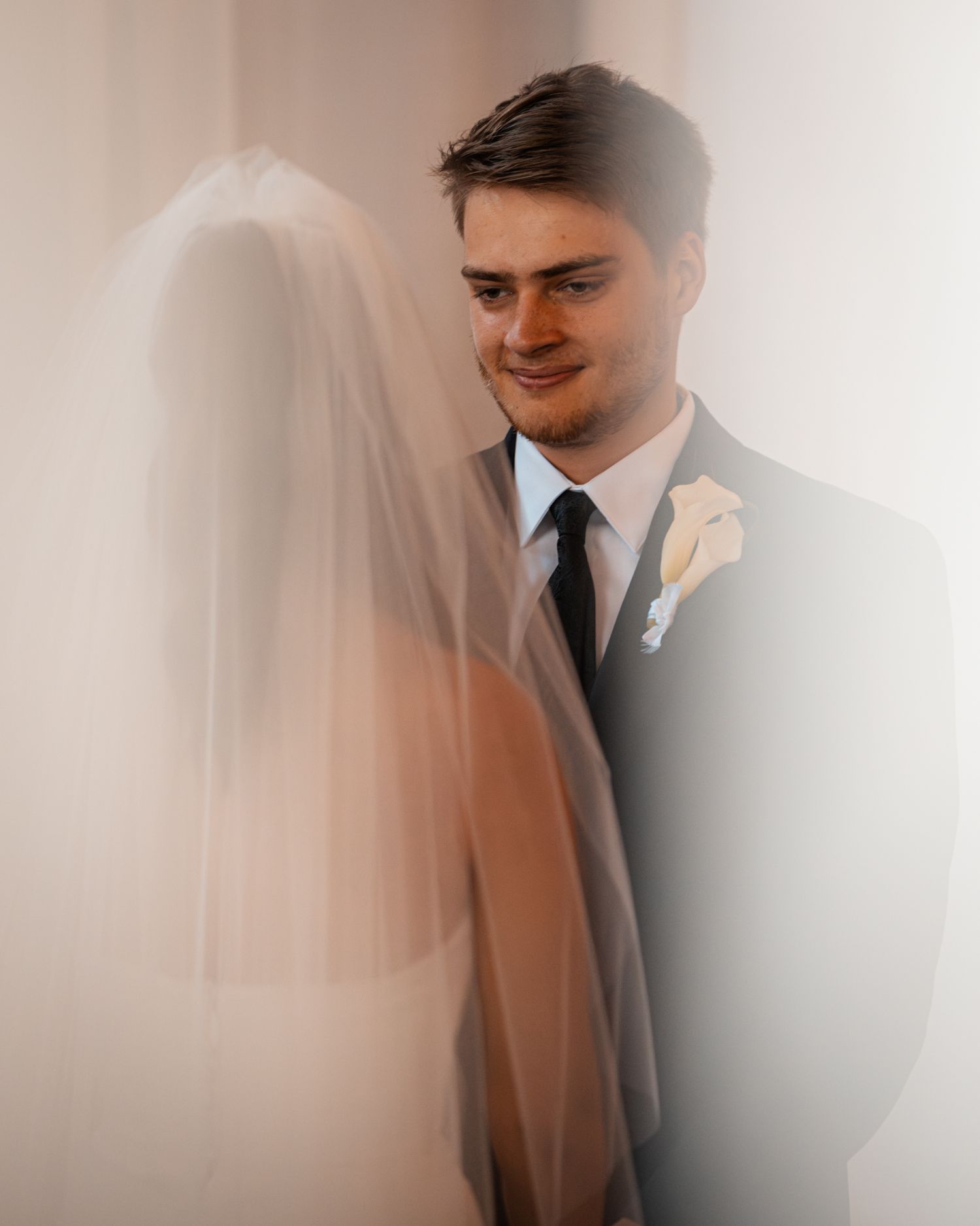Ethereal wedding portrait with soft focus and dreamy lighting.