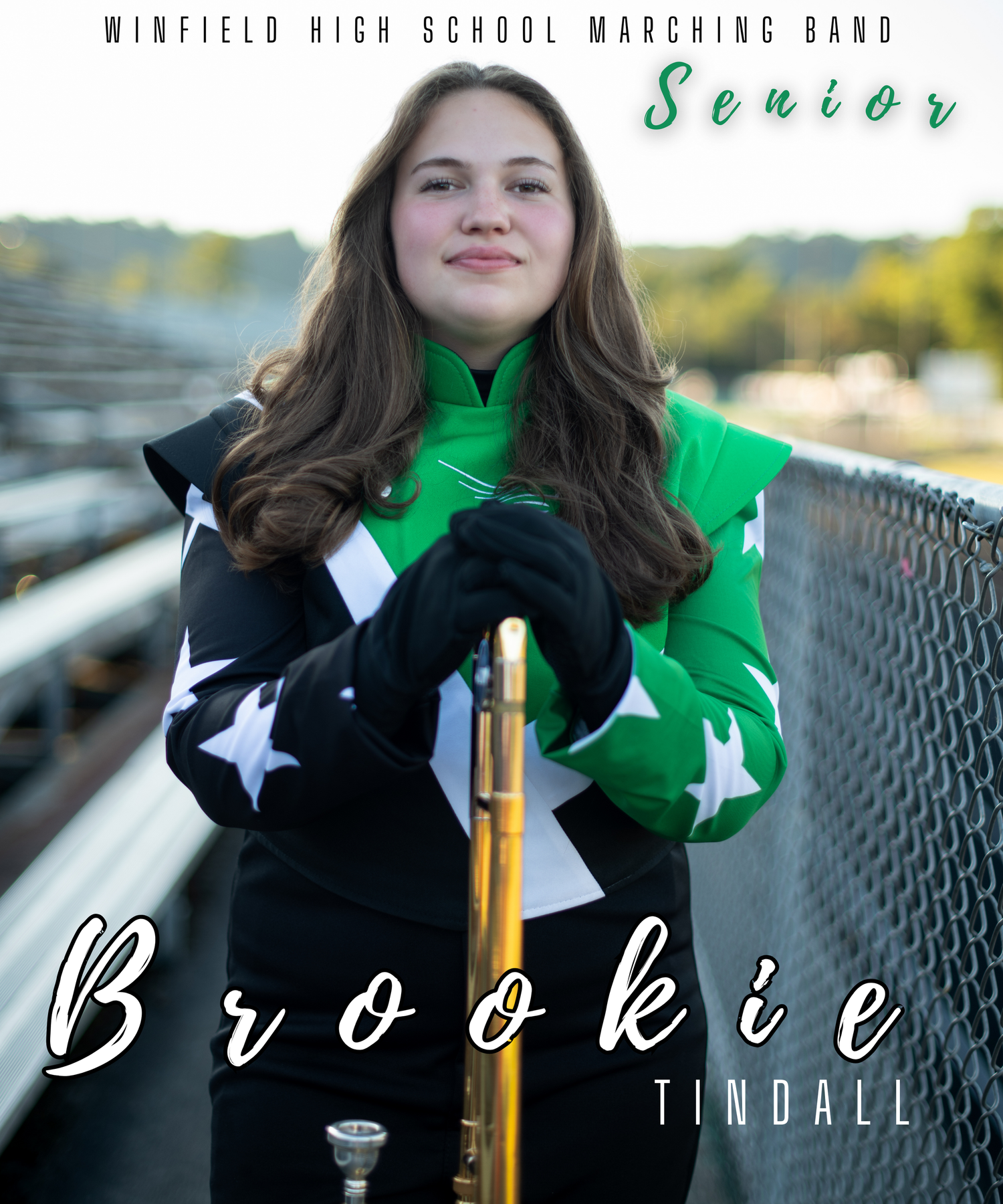 Senior portrait session featuring band member with flute and Winfield High School marching band uniform outdoors.