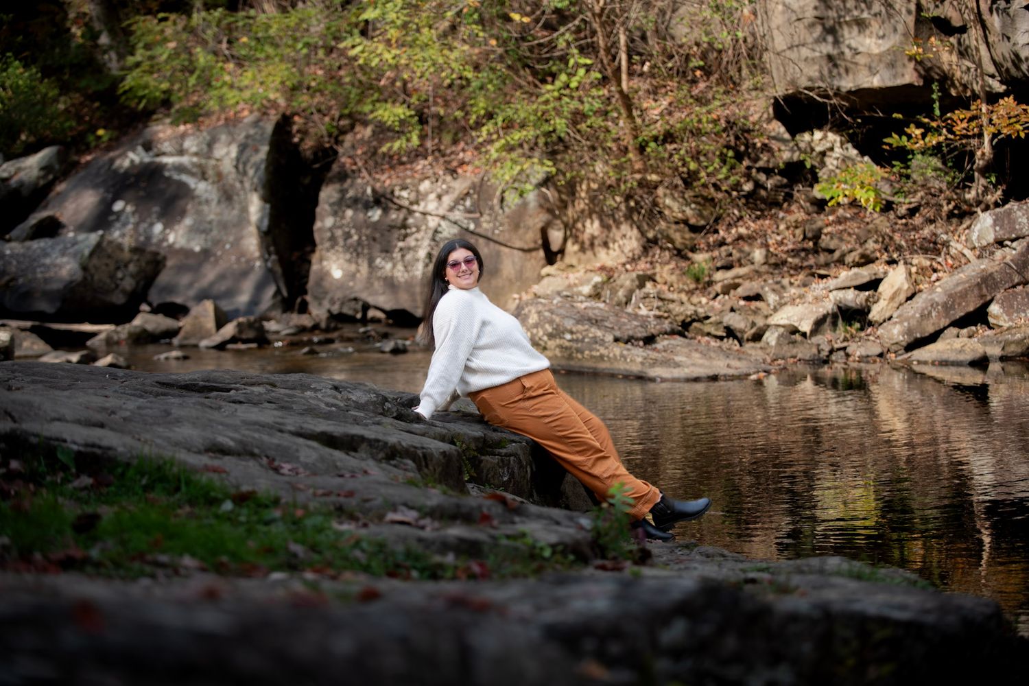 A scenic photo sequence showing a person taking a dip in a secluded natural swimming hole surrounded by rocky cliffs.