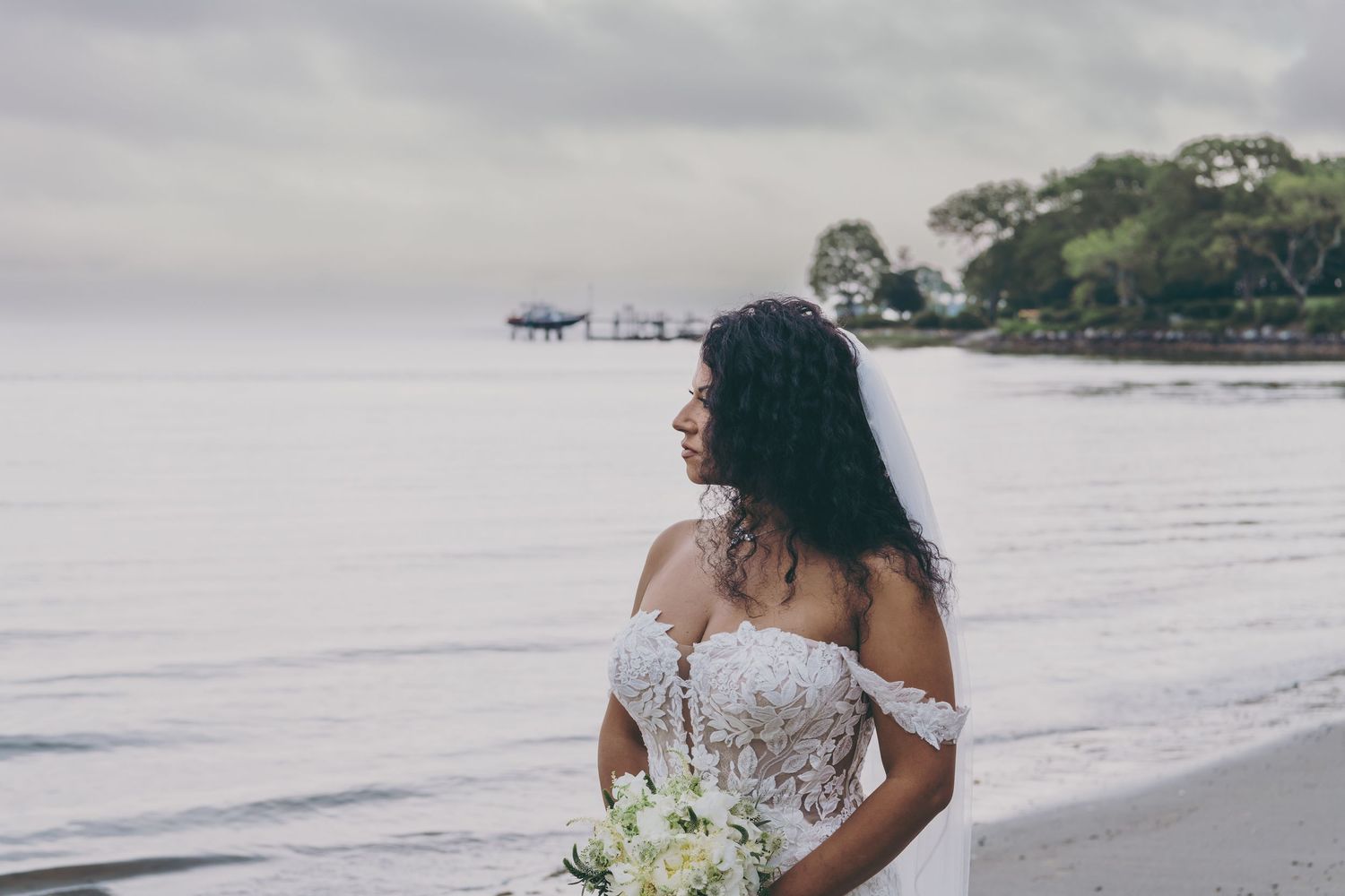 Collage of wedding photos on white background showing intimate moments at a beach setting.