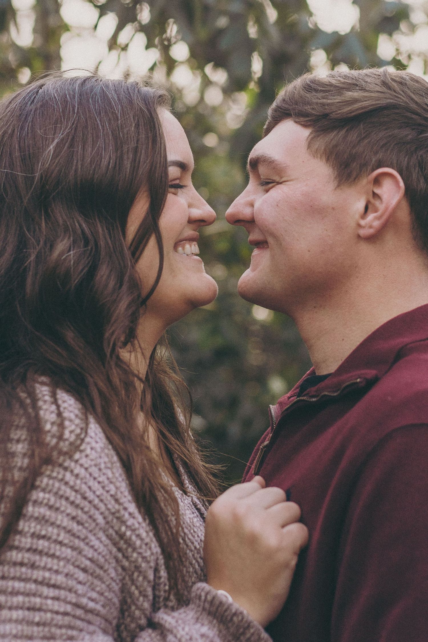 Romantic portrait sequence showing couple in warm autumn lighting.