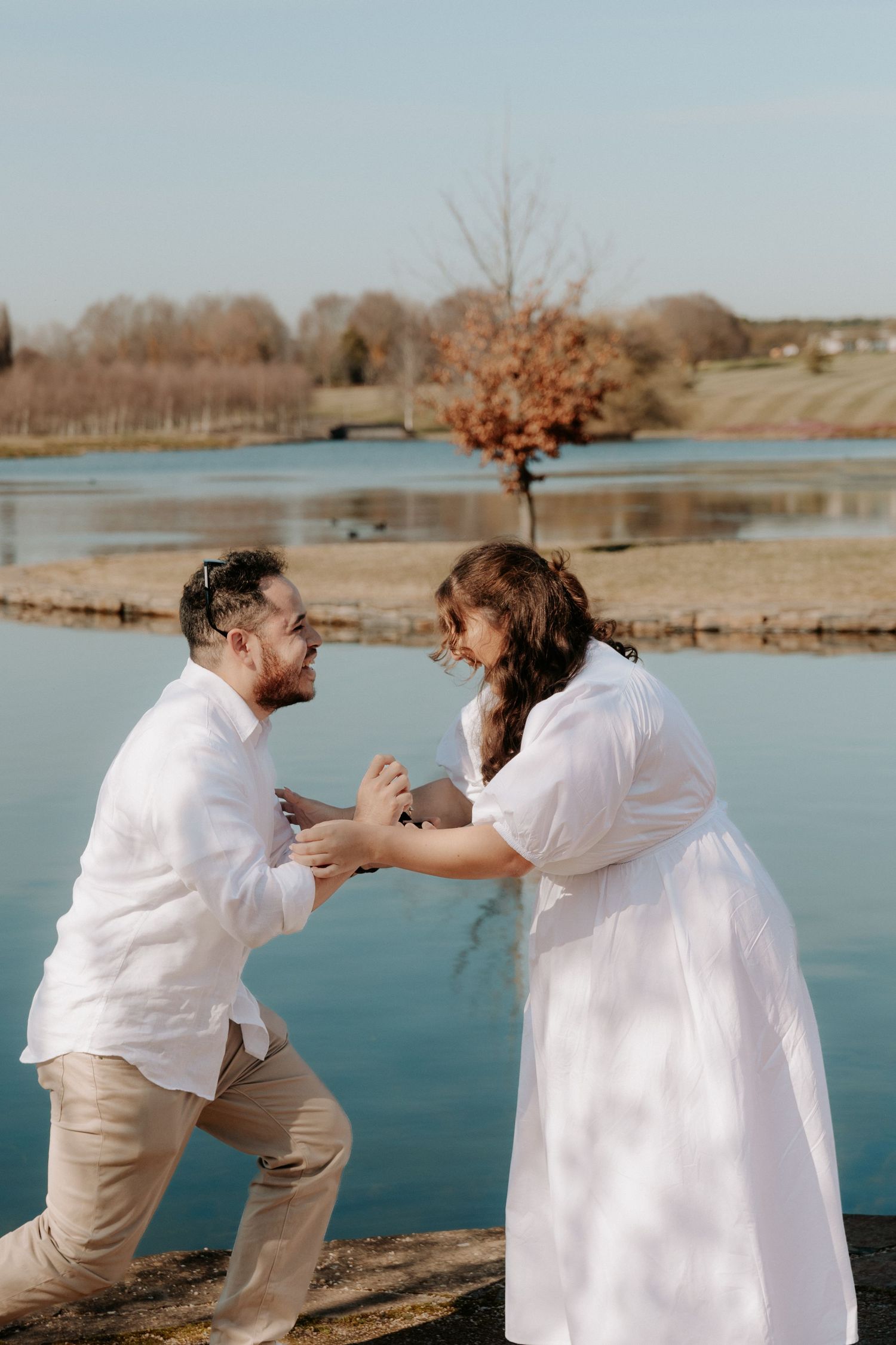 A man surprising his girlfriend with a wedding proposal at the Mayfield Gardens at Oberon