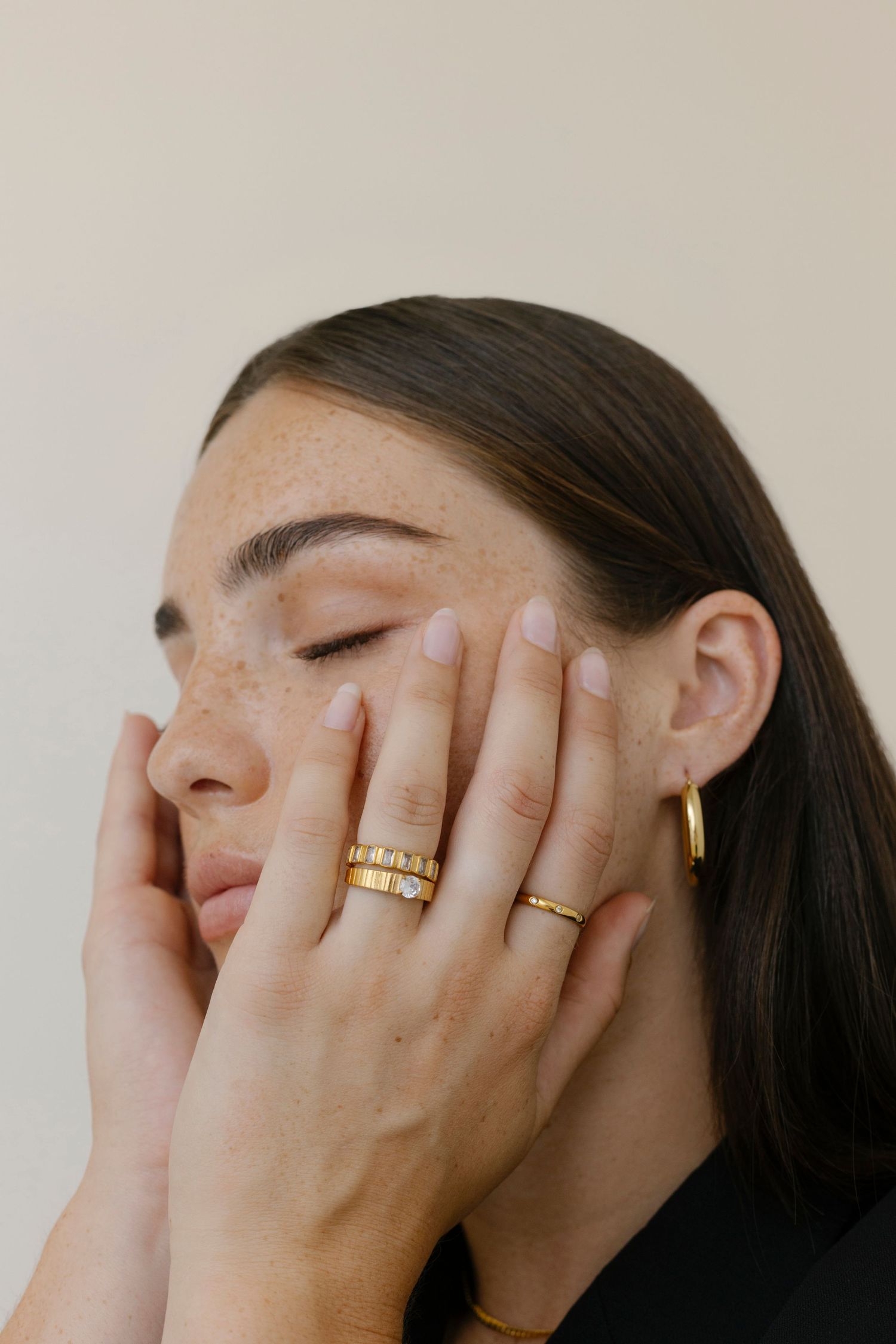 Woman with rings and earrings