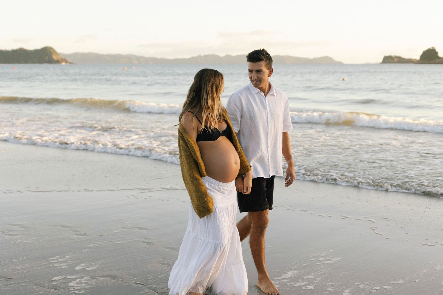 Maternity couple session on Hahei Beach