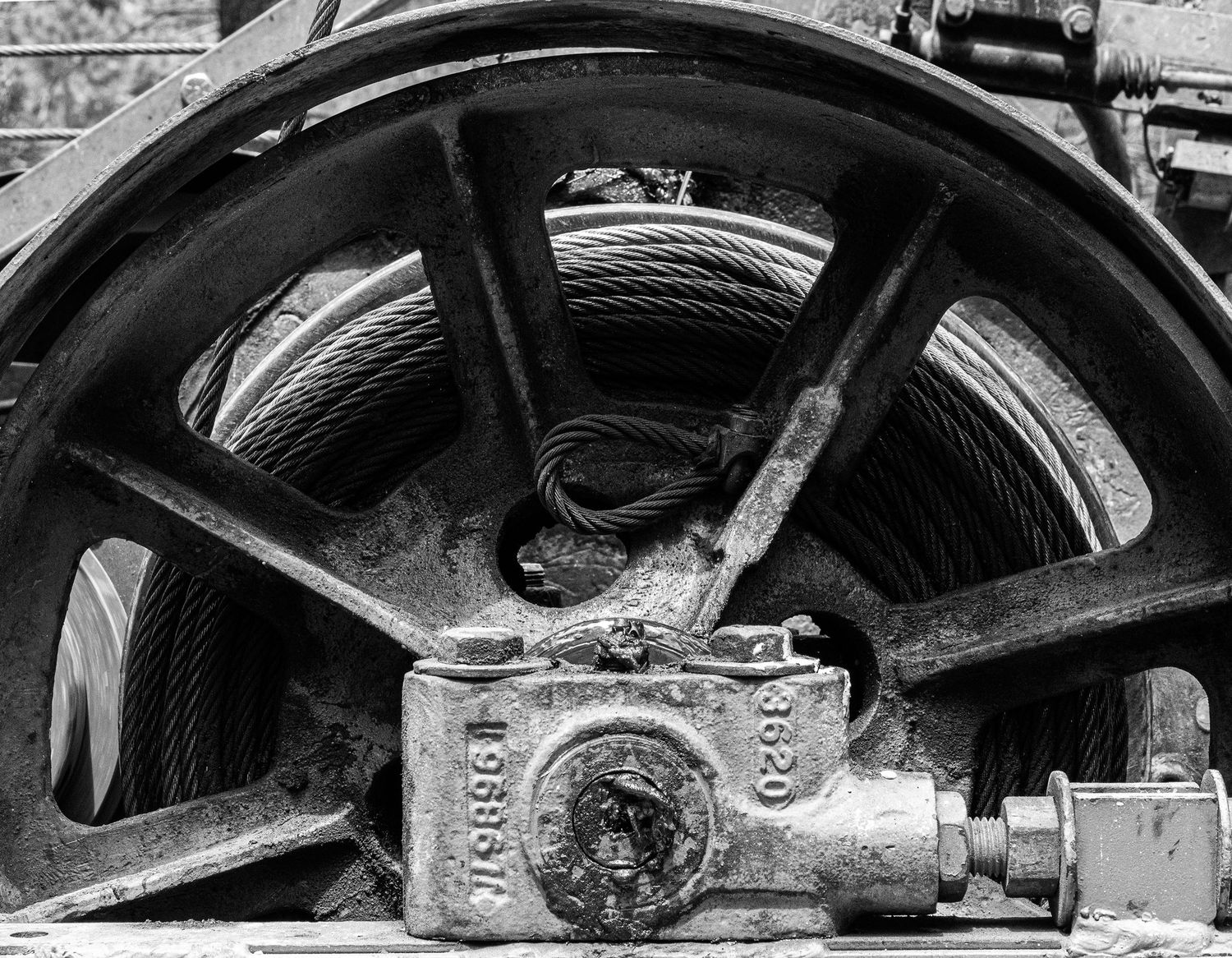 Close-up of vintage mechanical wheel assembly with metal components.