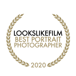 Gold achievement badge for Best Portrait Photographer 2020 with laurel wreath design.