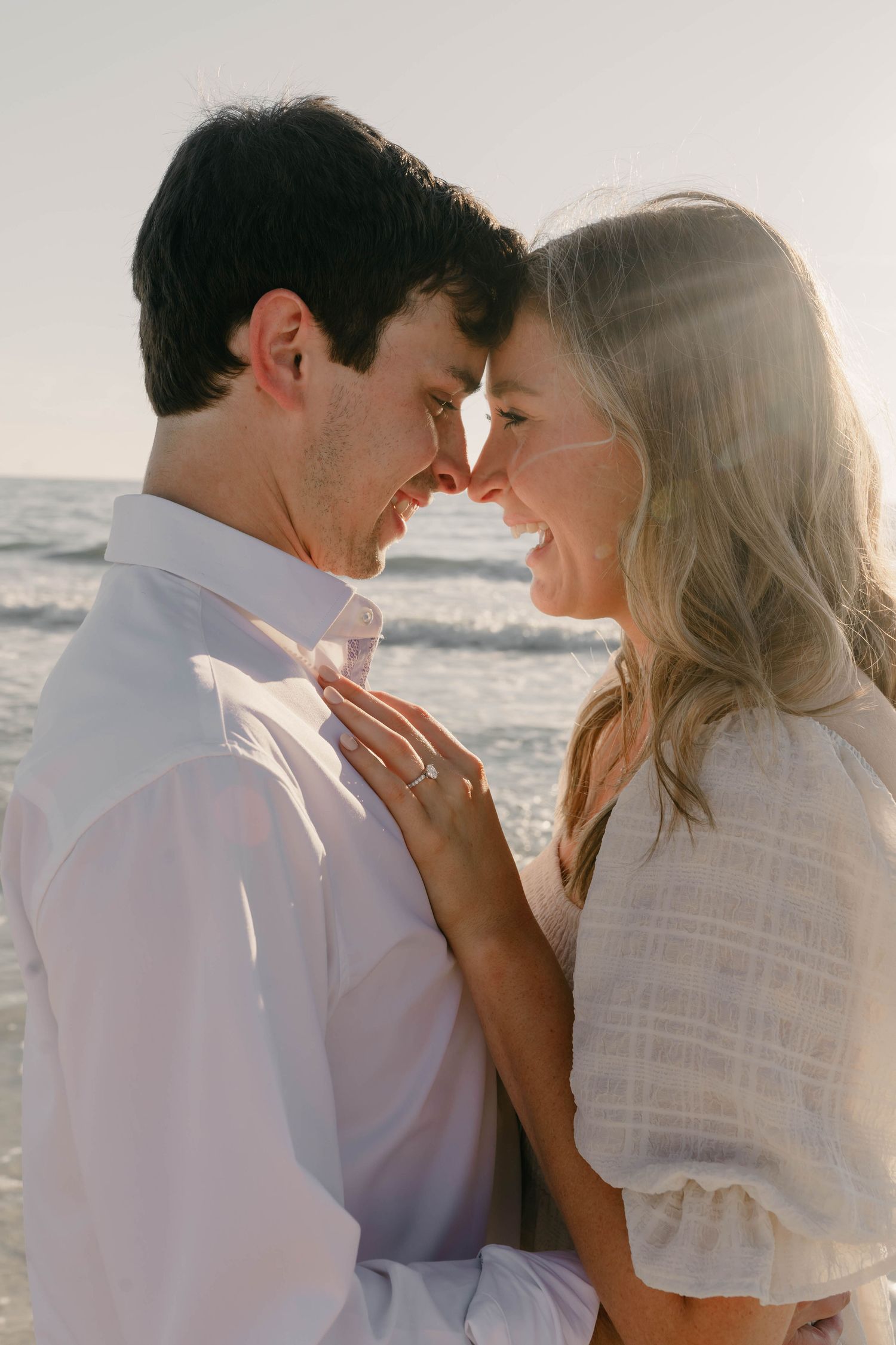 Romantic couple sharing intimate sunset kisses on the beach in a series of tender moments.