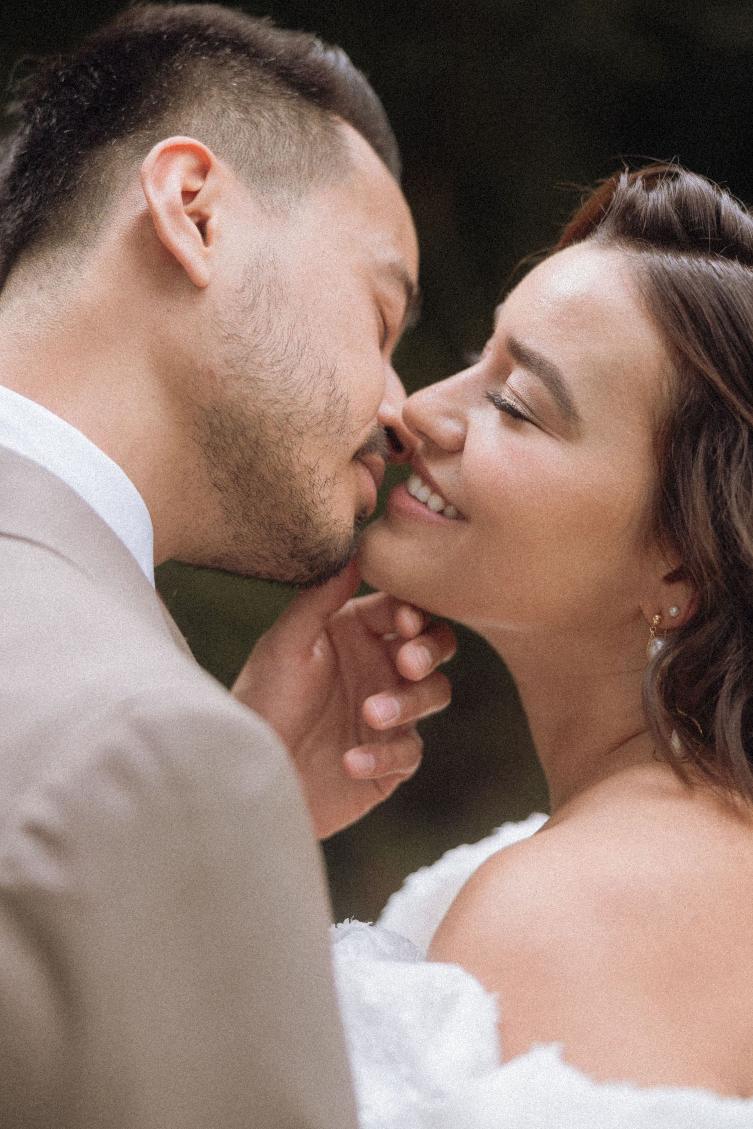 Romantic close-up sequence of a tender moment between newlyweds.