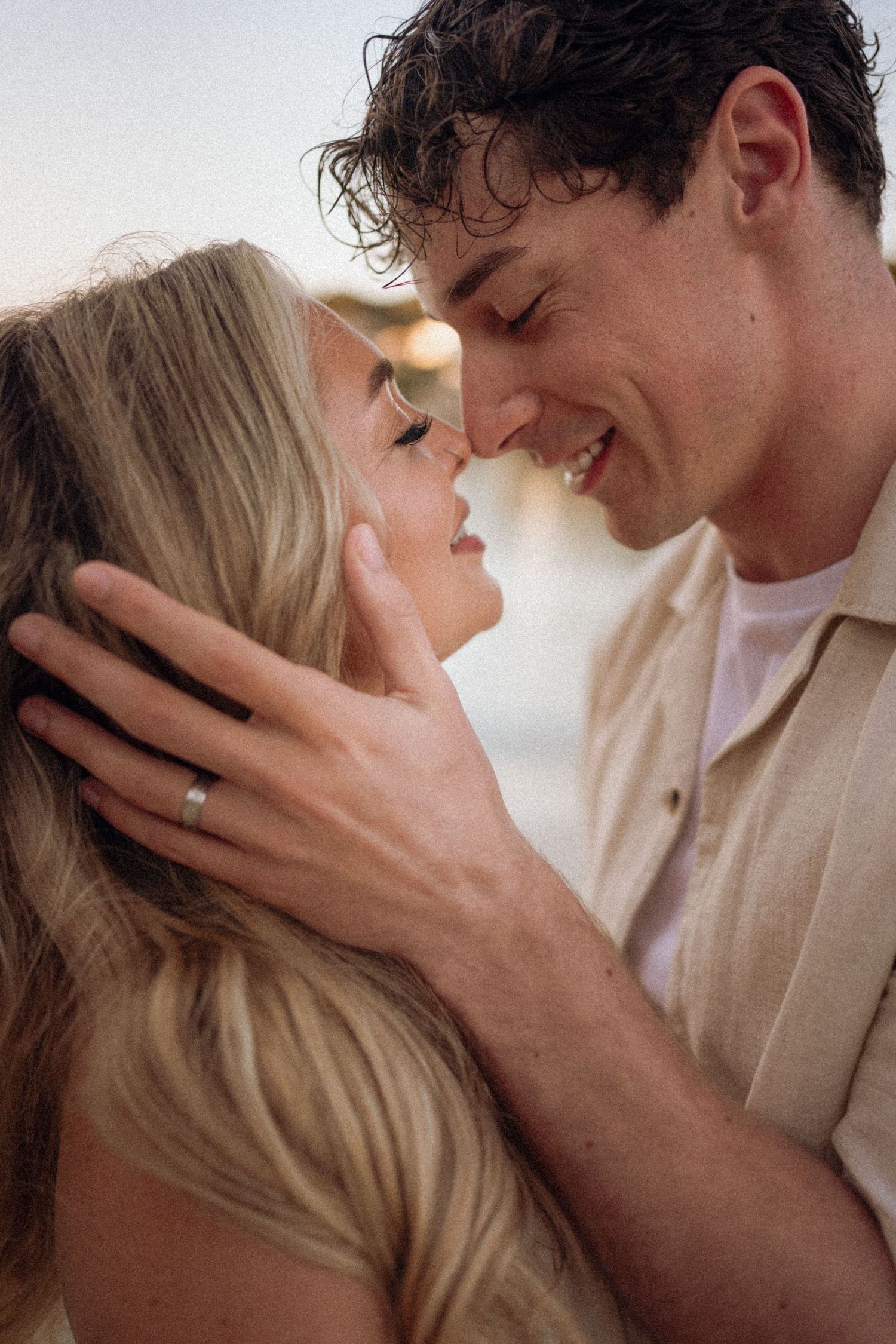 Intimate sequences of tender moments captured in soft white lighting.