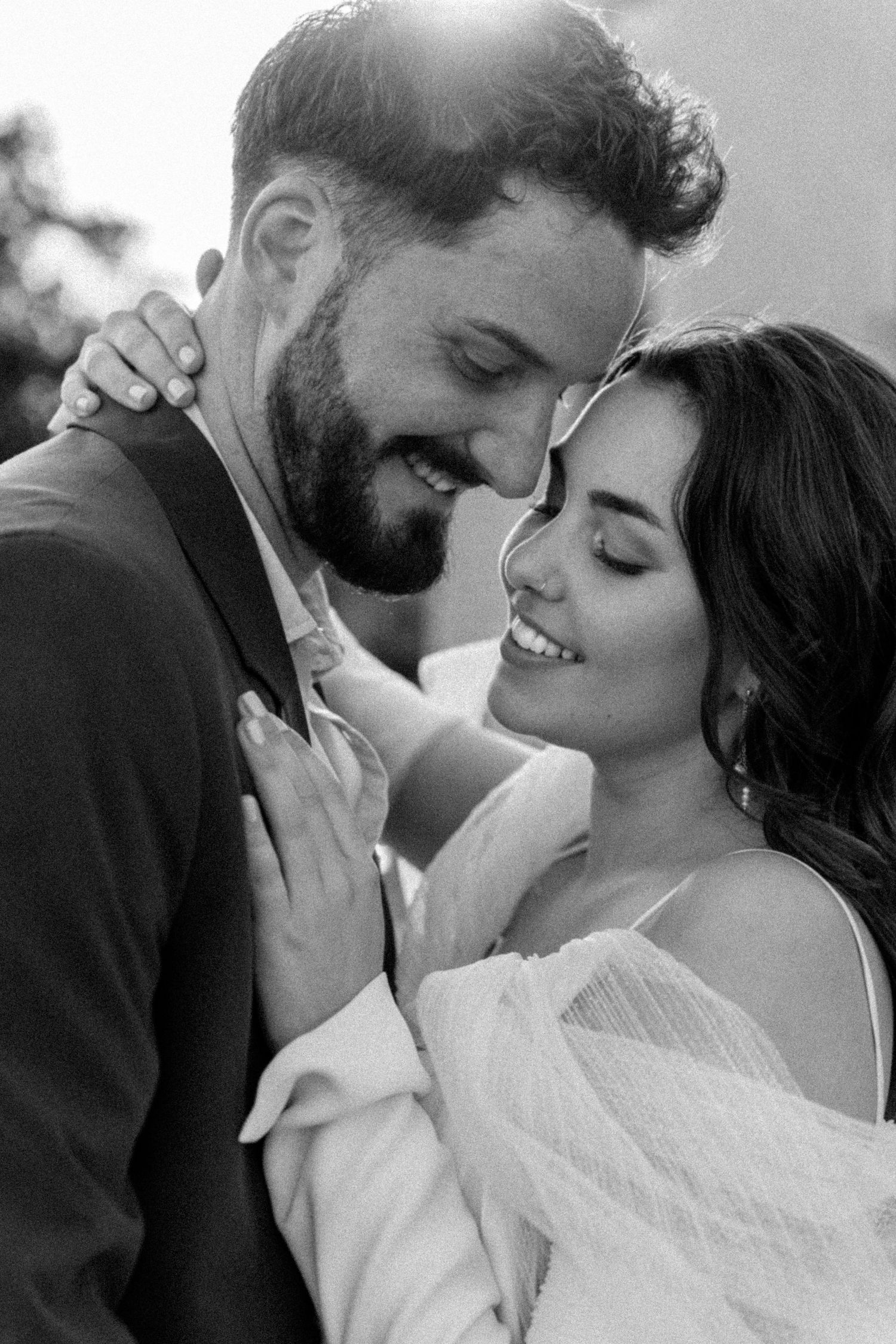 Intimate black and white wedding portraits capturing romantic moments.