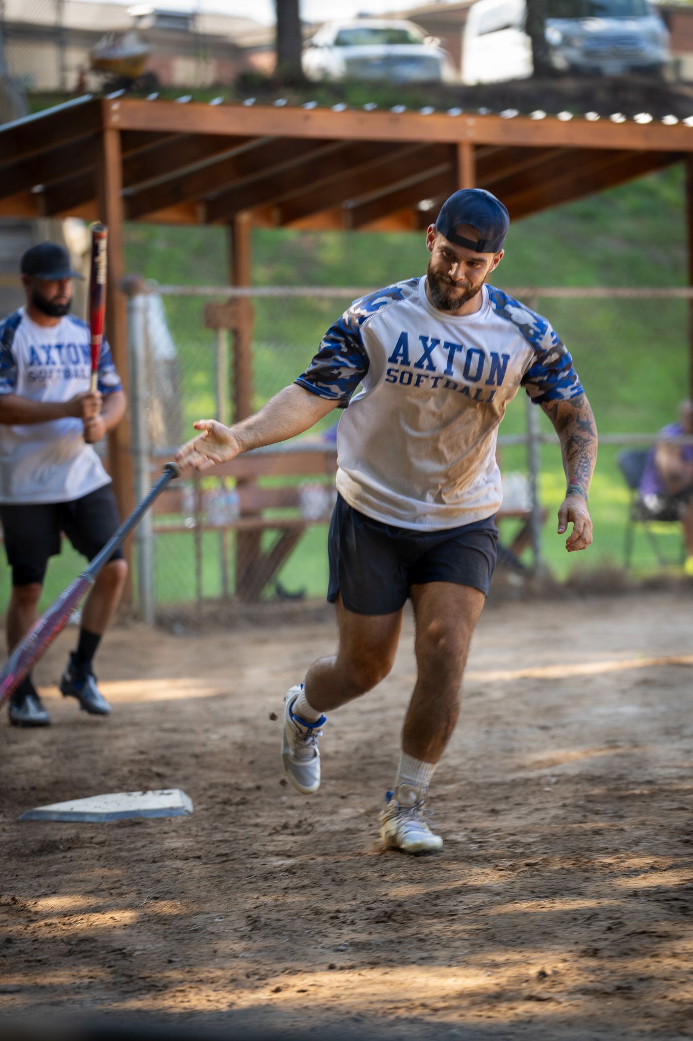 Baseball players sliding into bases during intense game action sequence.