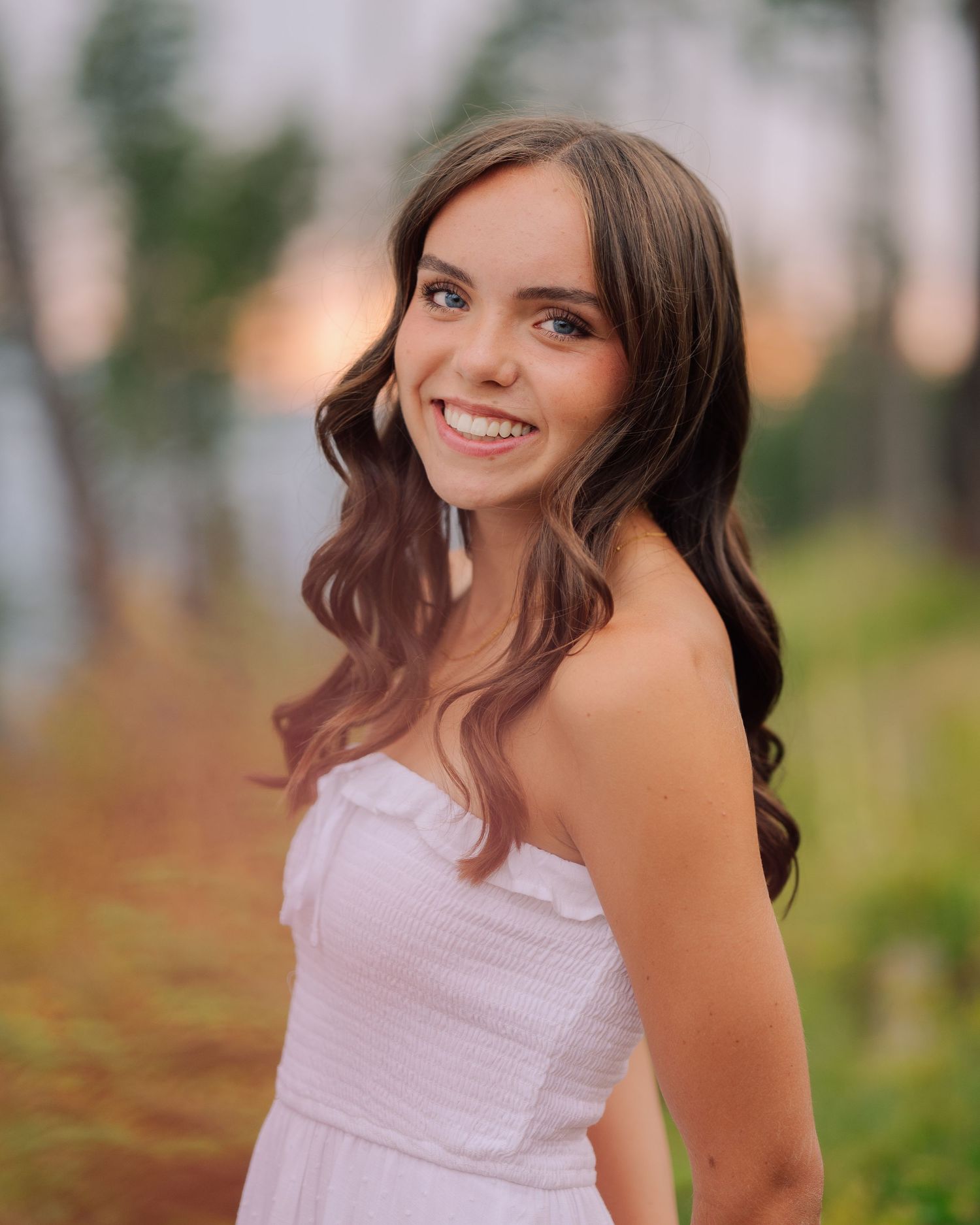 Senior portrait with dramatic Montana mountain scenery