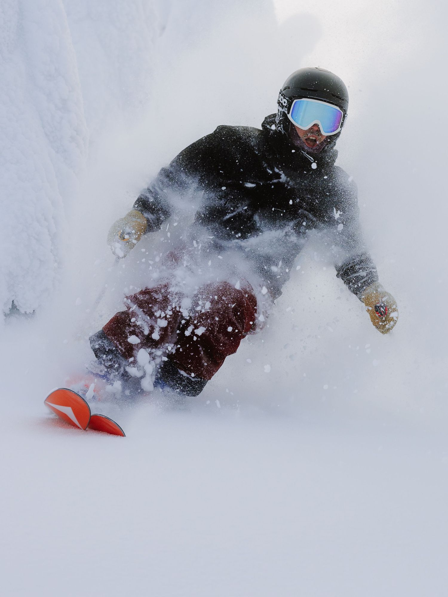 Skiing action photo in deep powder near Whitefish Mountain Resort