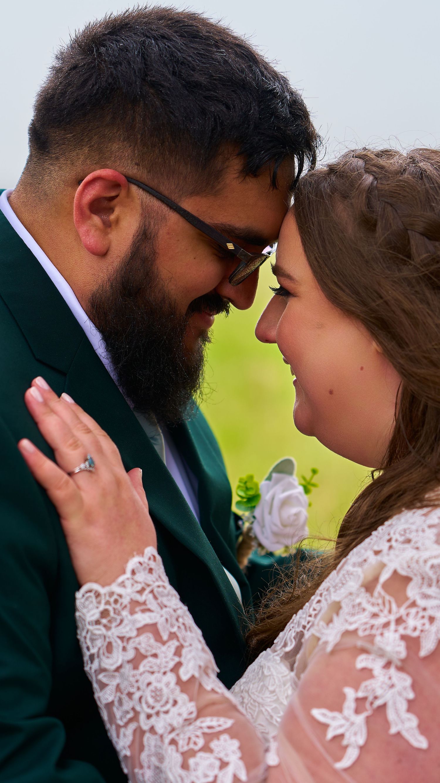 A romantic sequence of wedding photos showing a couple in formal attire sharing intimate moments together.