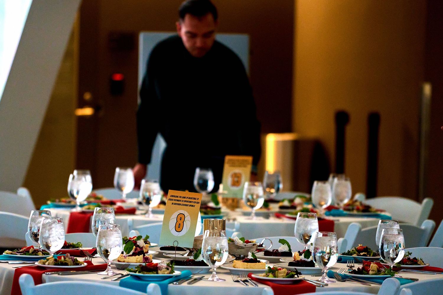 Elegant table setting with place cards and formal dining arrangements.