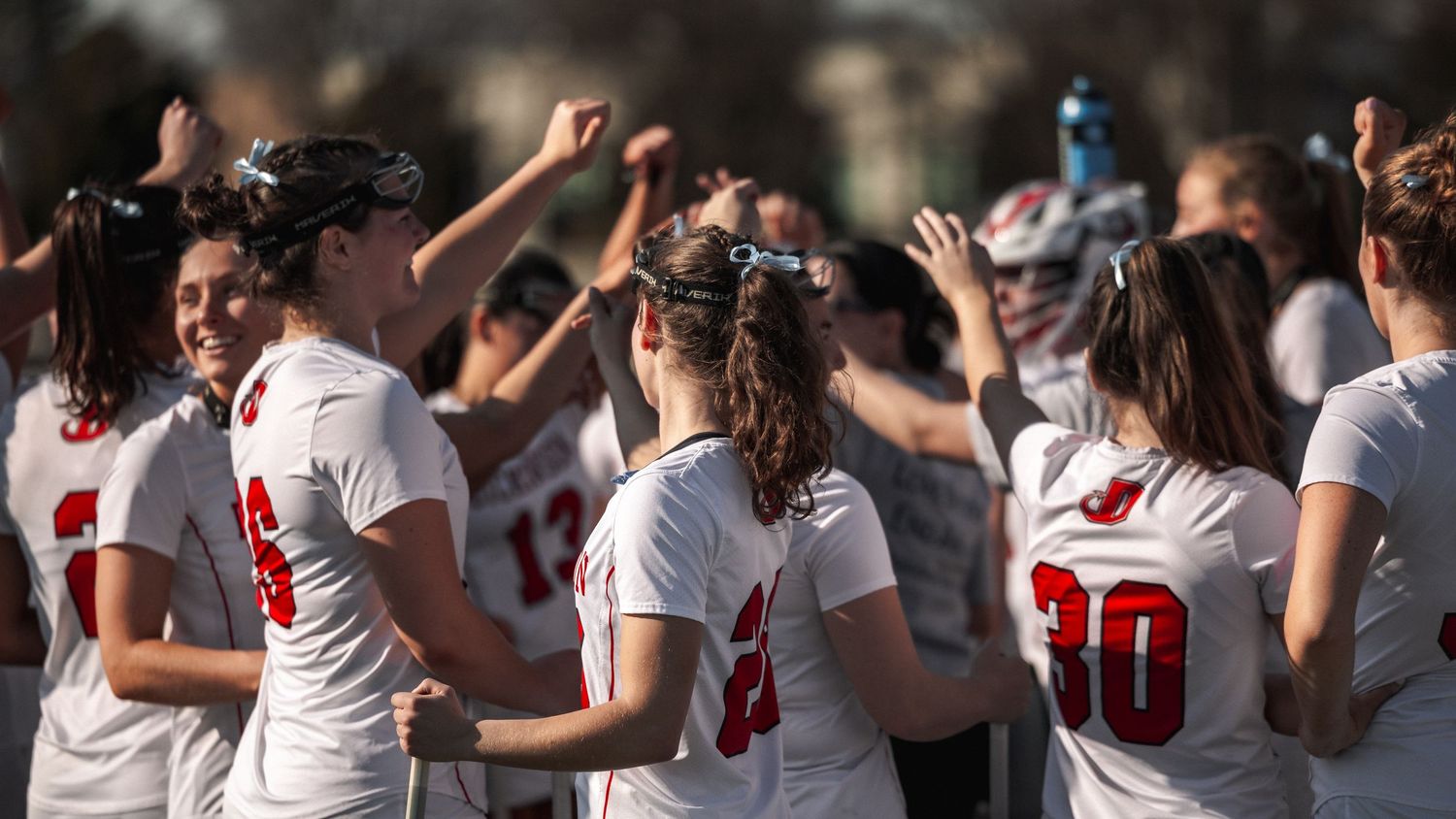 Dickinson College Womens Lacrosse Team huddle Photo against Desales University.