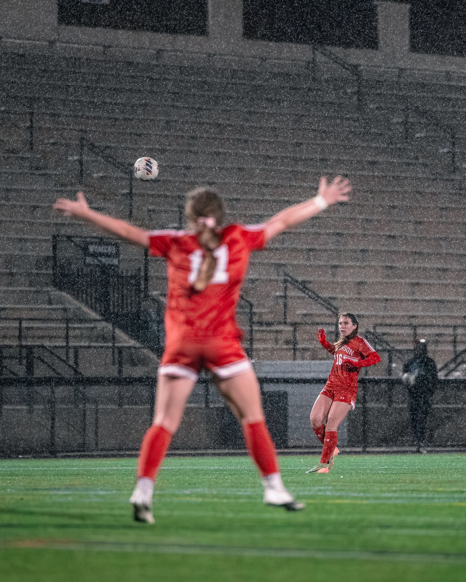 A sequence of five action shots showing a soccer player performing a cartwheel celebration on the field.