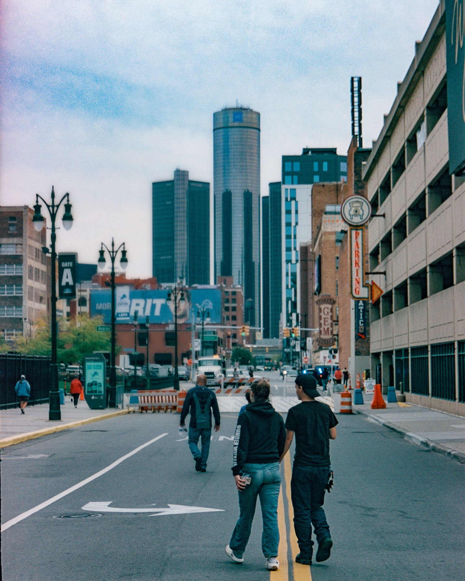 Urban street scene with Renaissance Center towers in downtown Detroit.
