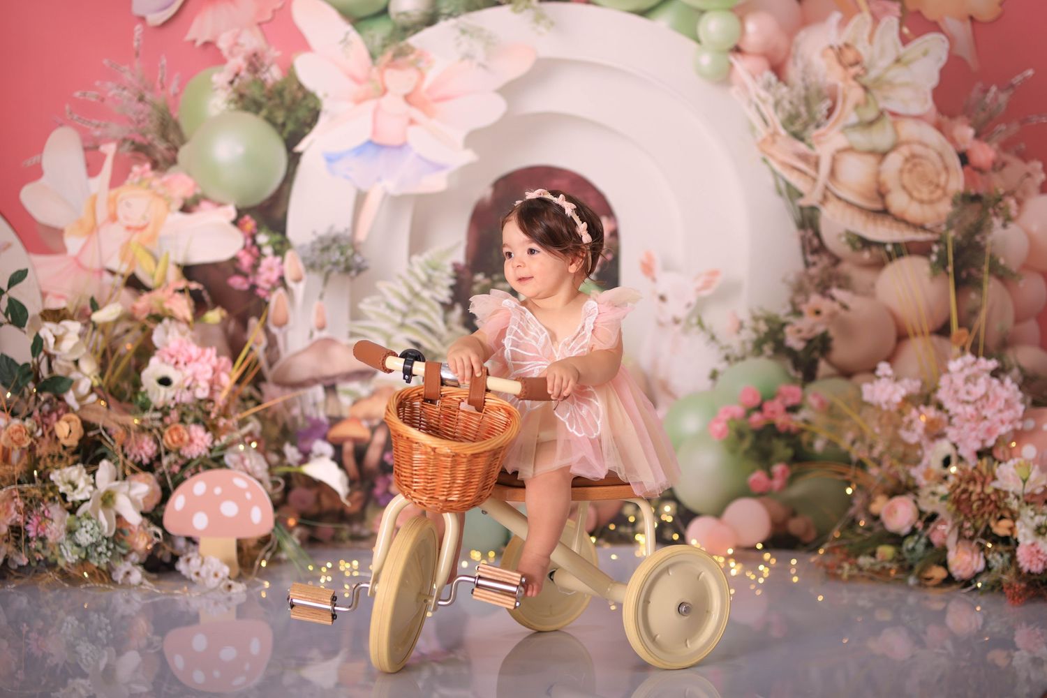 A dreamy pink floral wedding reception setting with soft lighting and romantic table decorations. Dubai Photographer