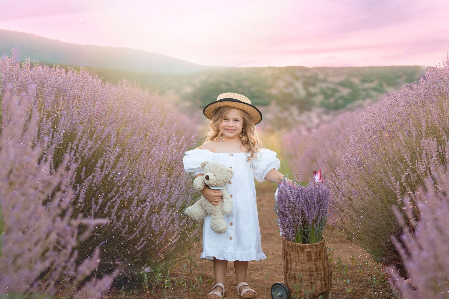 Whimsical portrait in a lavender field with someone holding a teddy bear and basket. Dubai Photographer