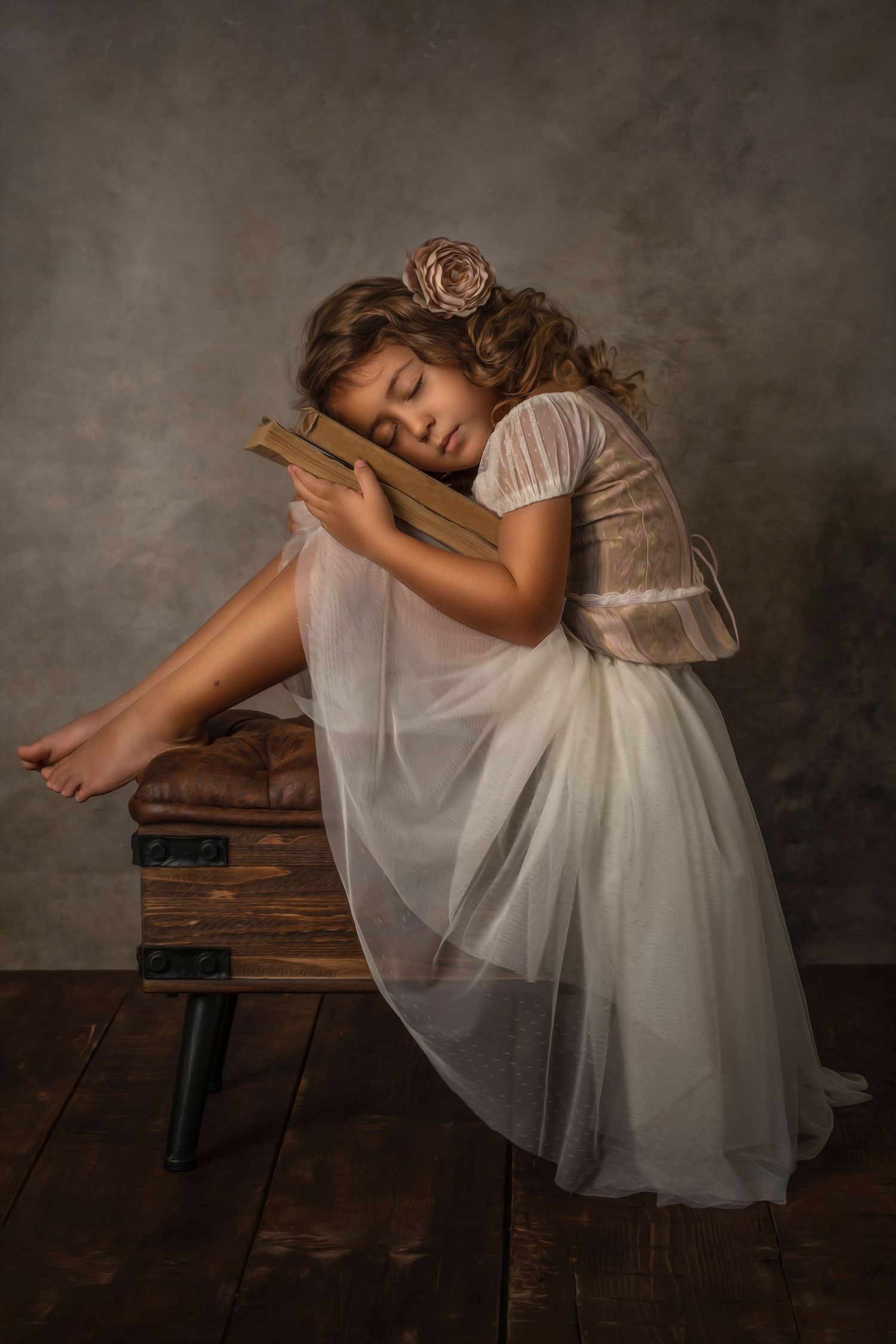 Dreamy vintage-style portrait with white dress resting on wooden crate. Dubai Photographer