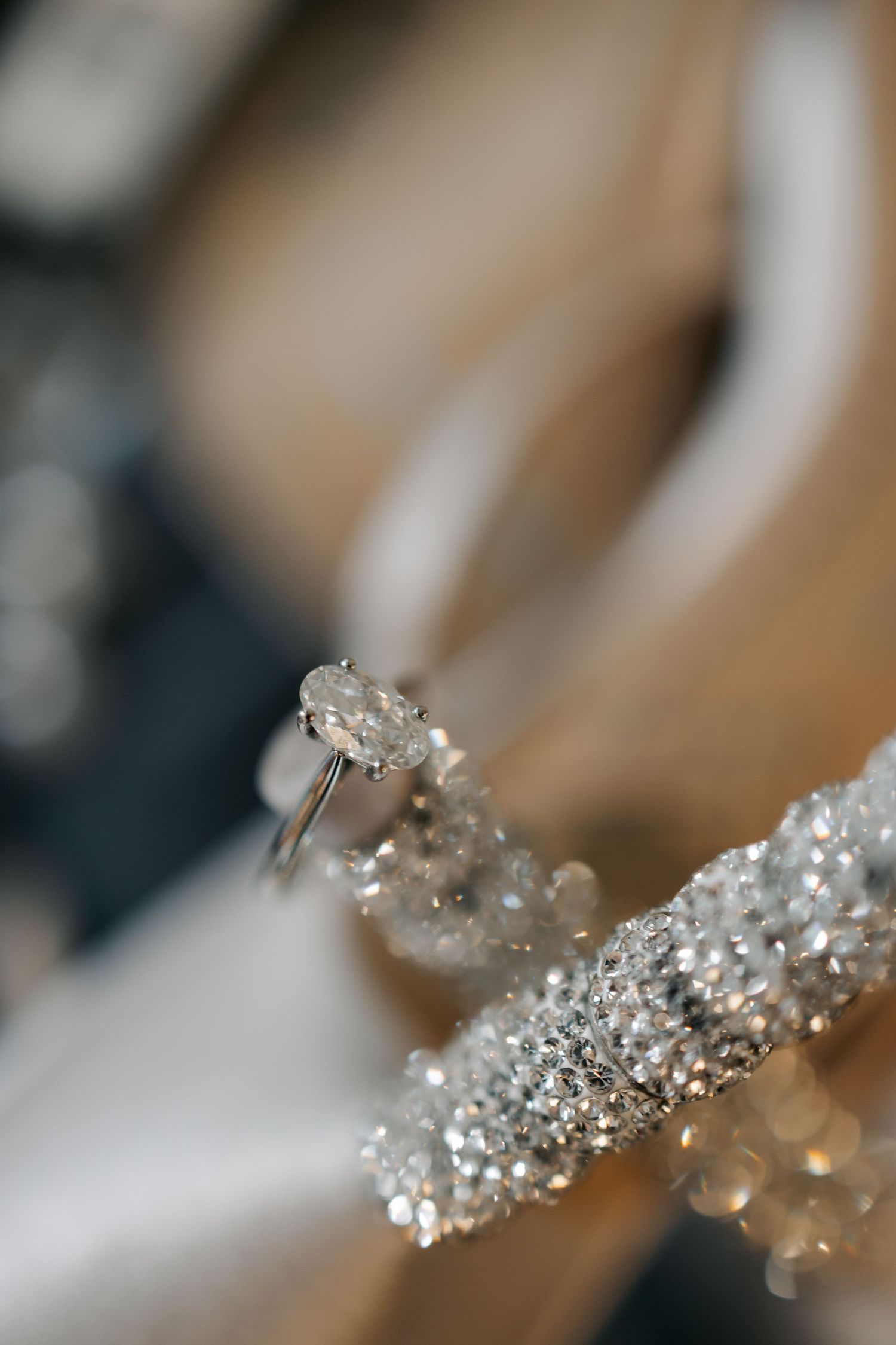 Close-up macro shot of sparkling crystal or ice formations with bokeh effect.