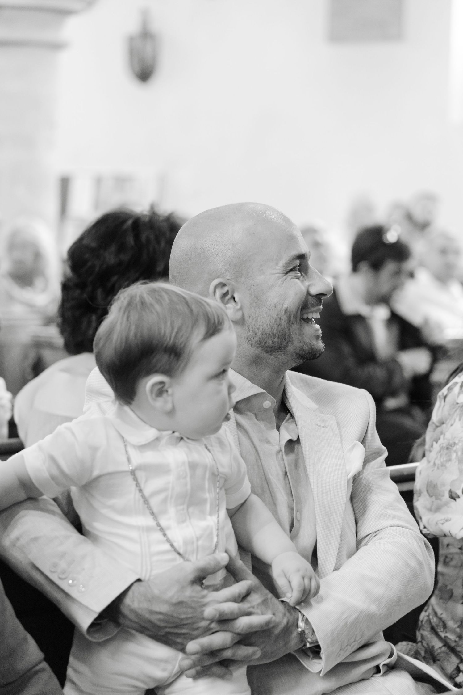 A tender moment shared between two guests during a formal celebration.