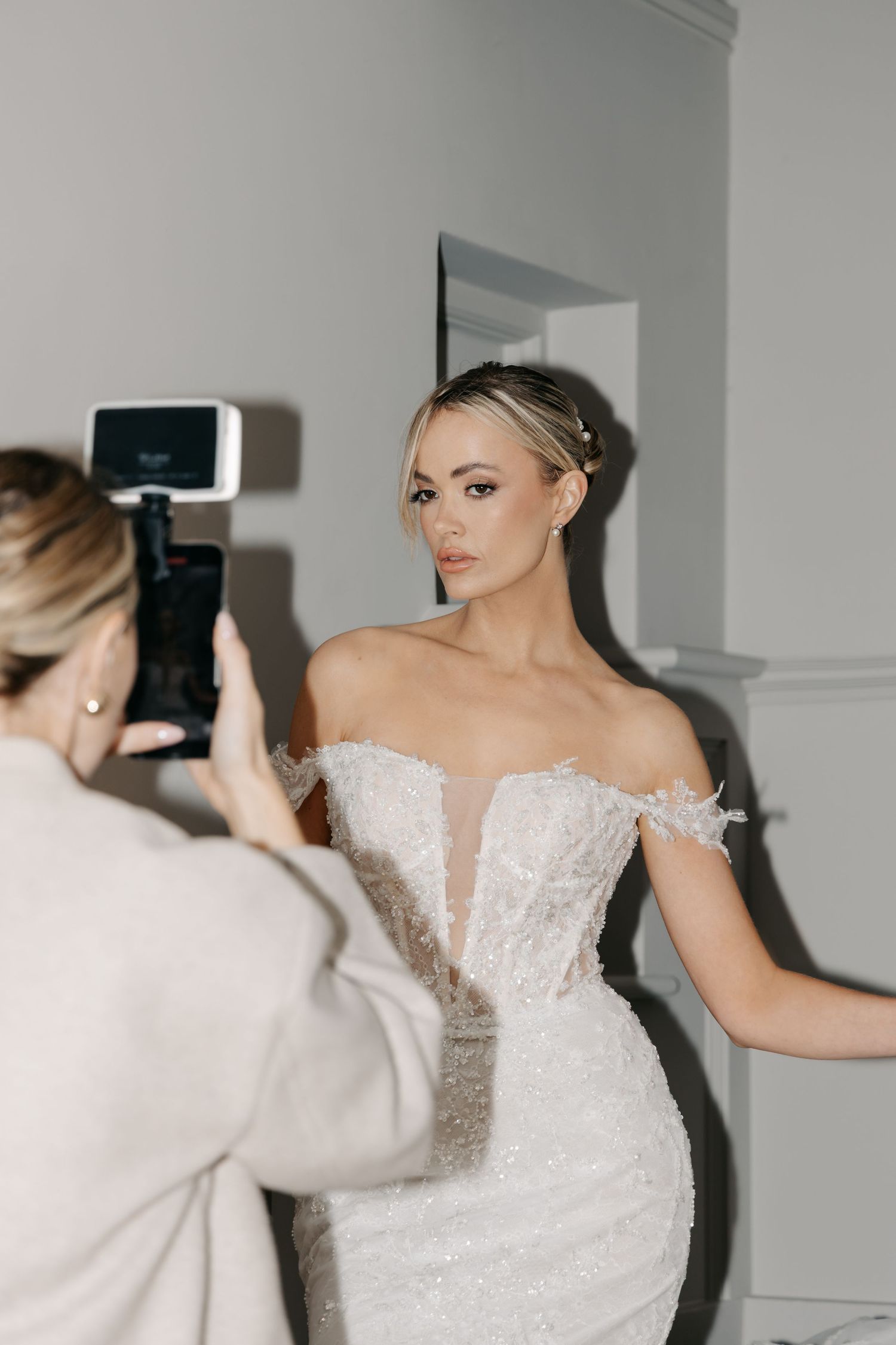 Wedding photography session showing multiple angles of a bride in an ornate white dress.