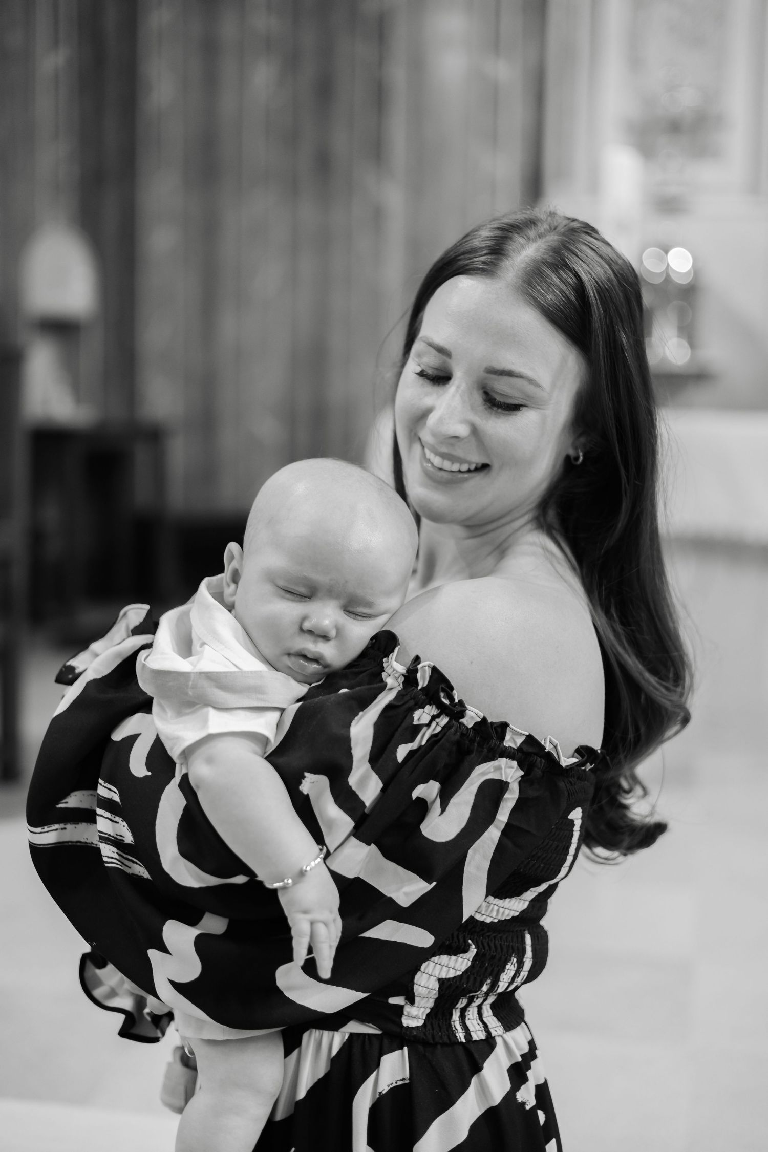 Black and white candid photos showing joyful moments between loved ones.