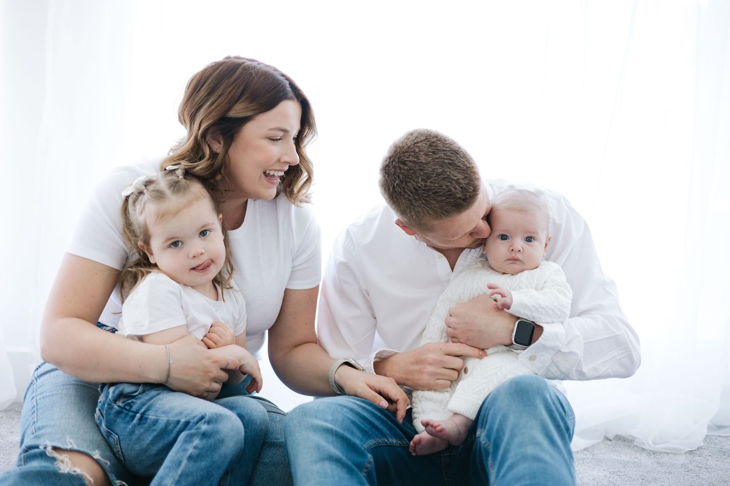 Candid family moments captured in a series of loving interactions on white background.