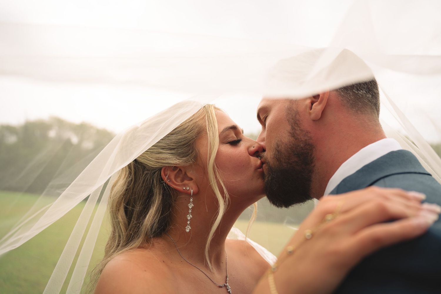 Close-up romantic wedding photos showing tender moments between a couple.