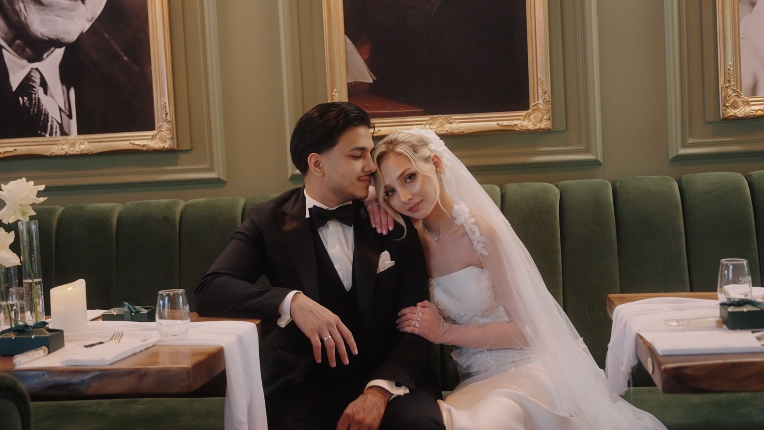 Romantic wedding couple moments captured in an elegant restaurant setting.
