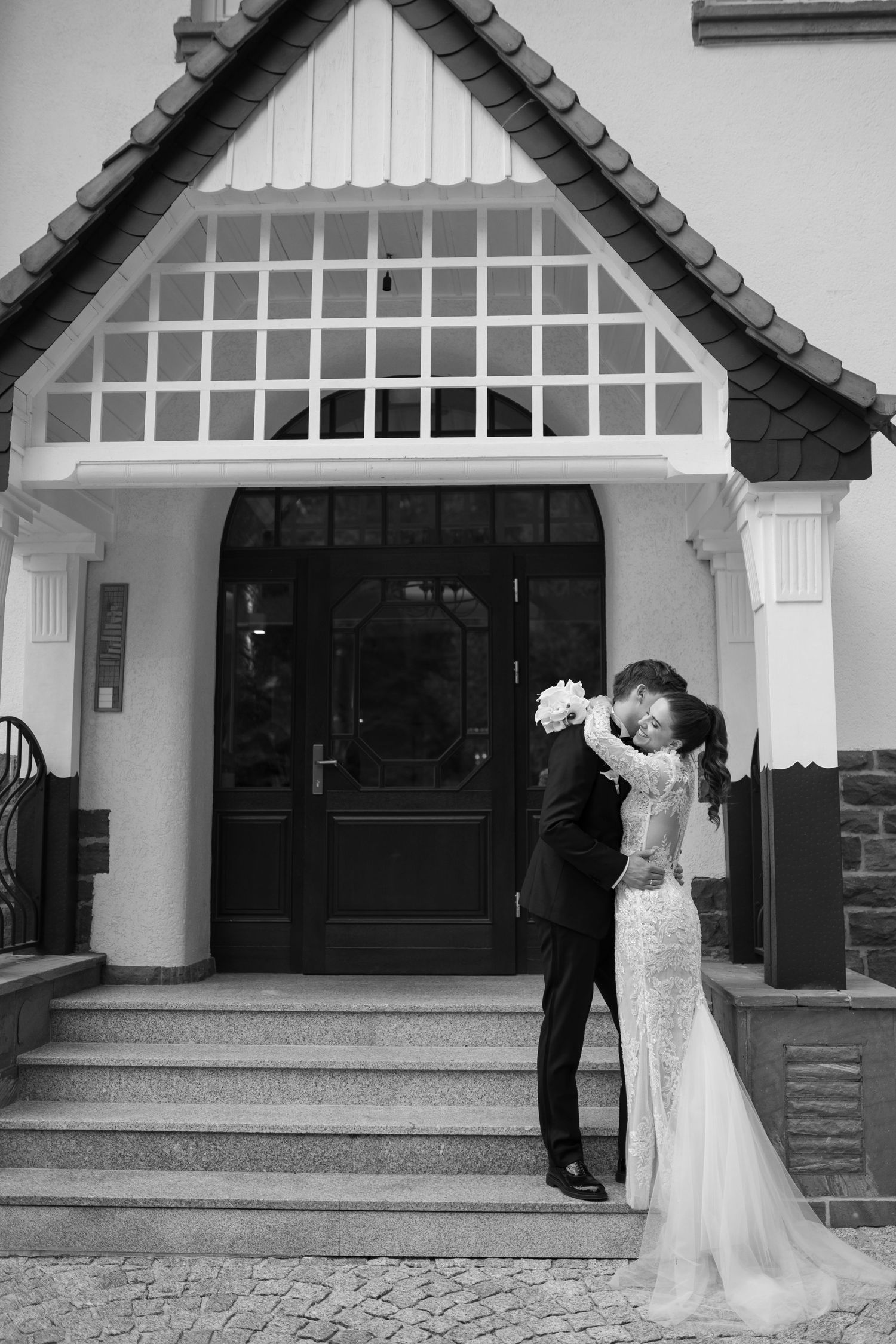 A sequence of romantic wedding photos showing a couple in front of a white building with arched entrances.
